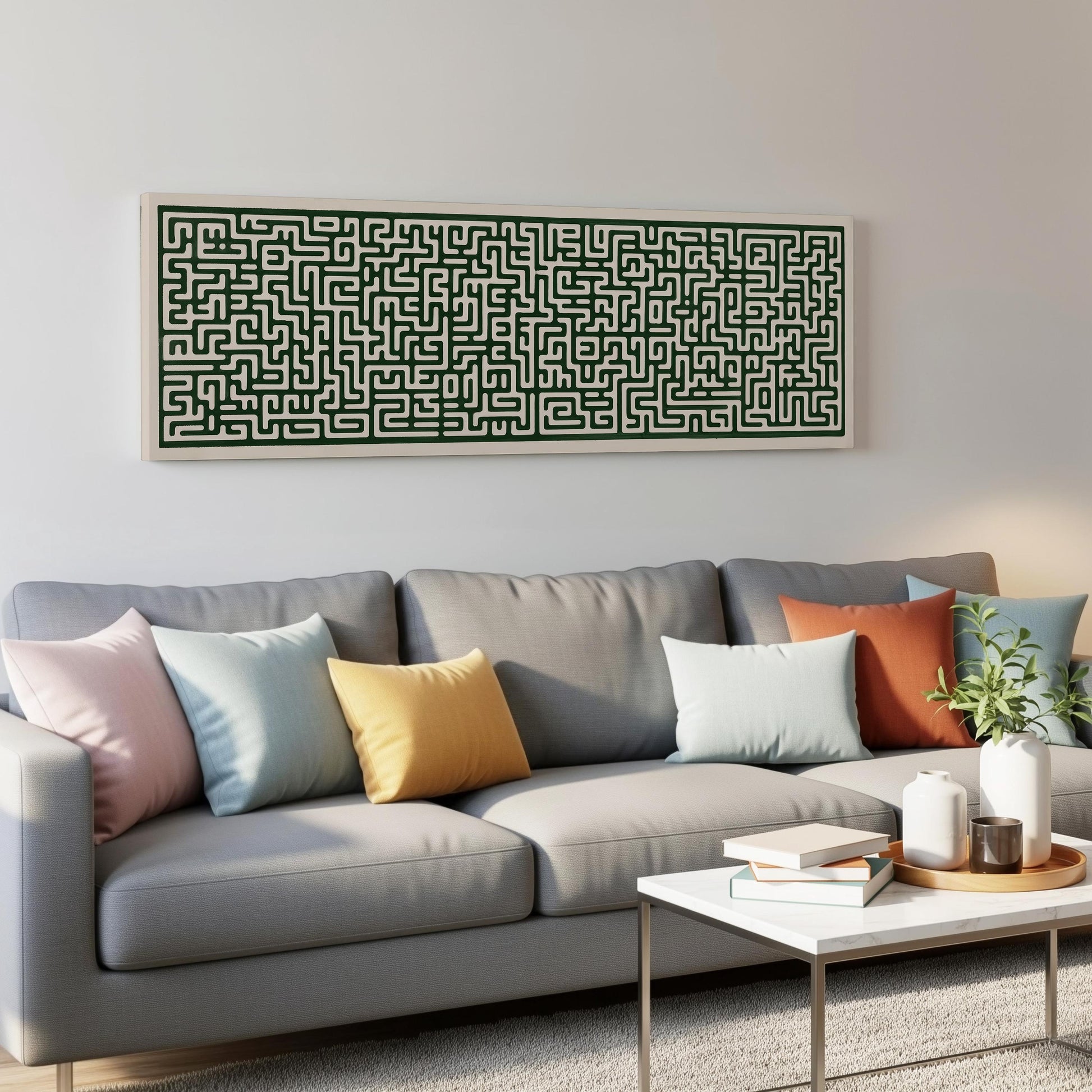 a gray couch with colorful throw pillows, a white coffee table, and a large abstract painting hanging on the wall above the couch.
