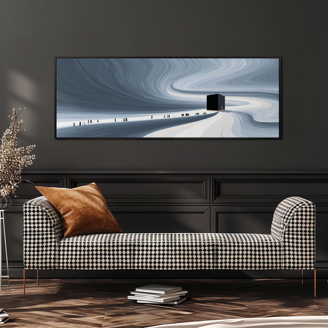 a large, white couch with gray and white patterned throw pillows, and a framed artwork depicting a snowy landscape with a small building in the distance.