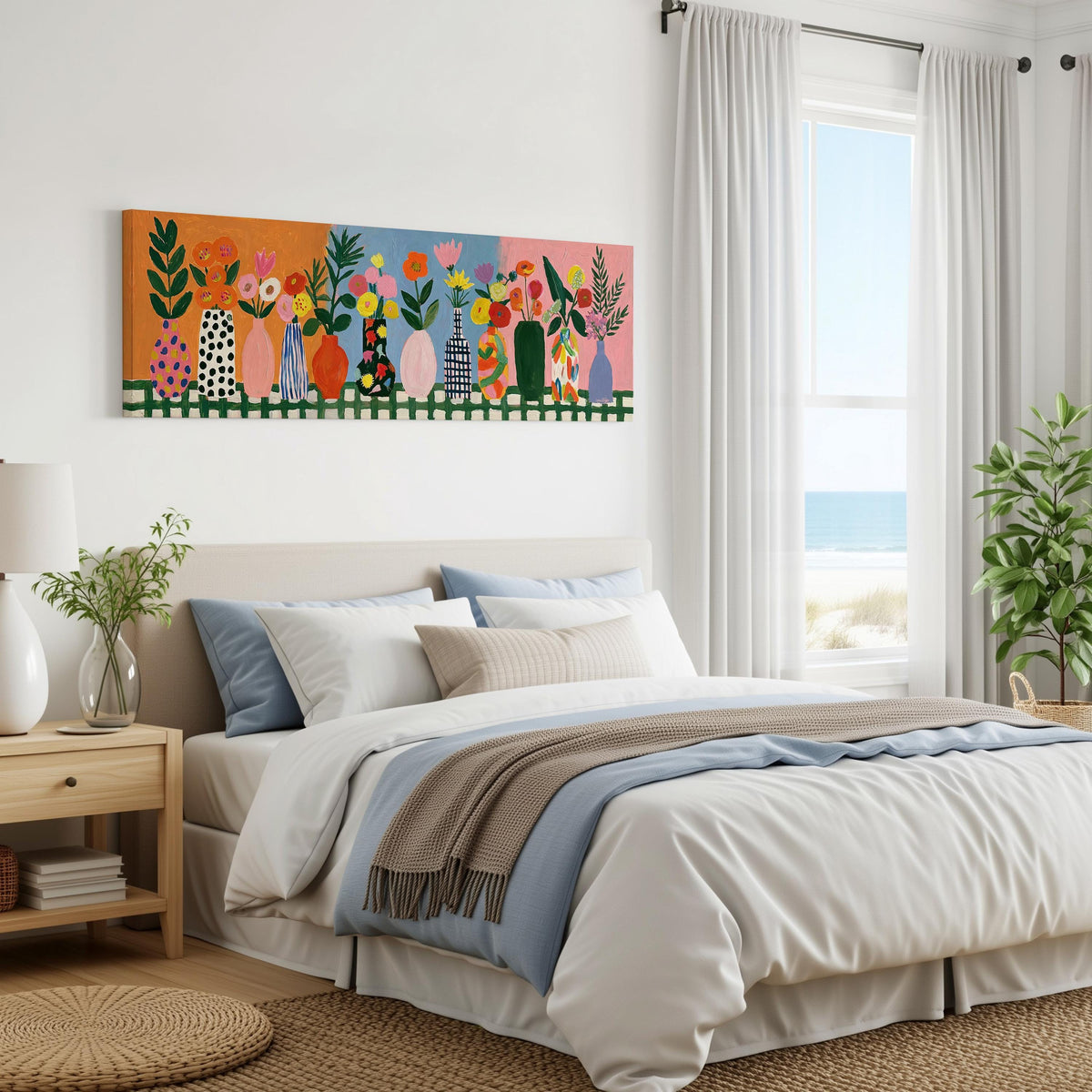 Folk art flower vases on orange and blue panoramic canvas print above a bed in a coastal bedroom