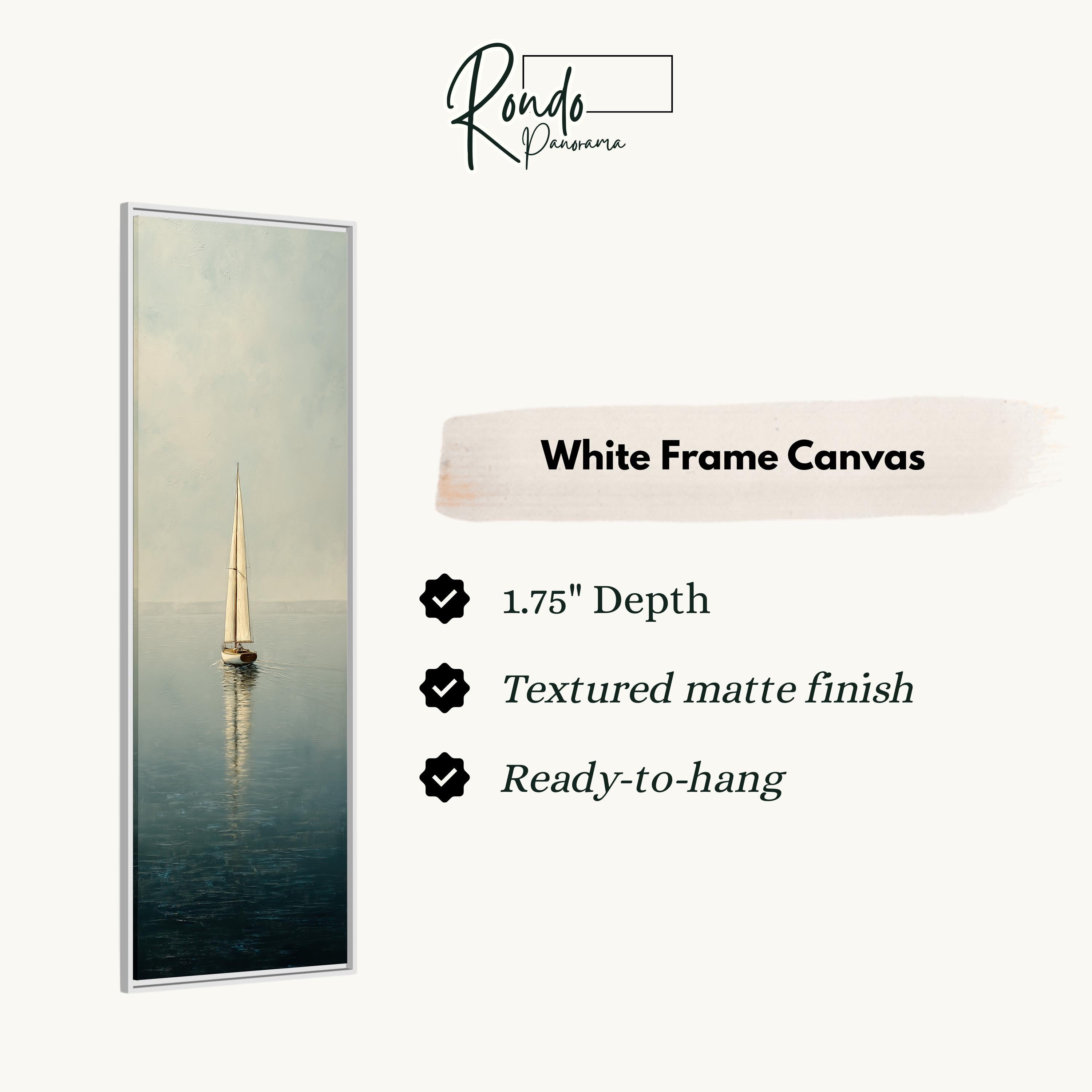 a white frame canvas with a painting of a sailboat on the water.