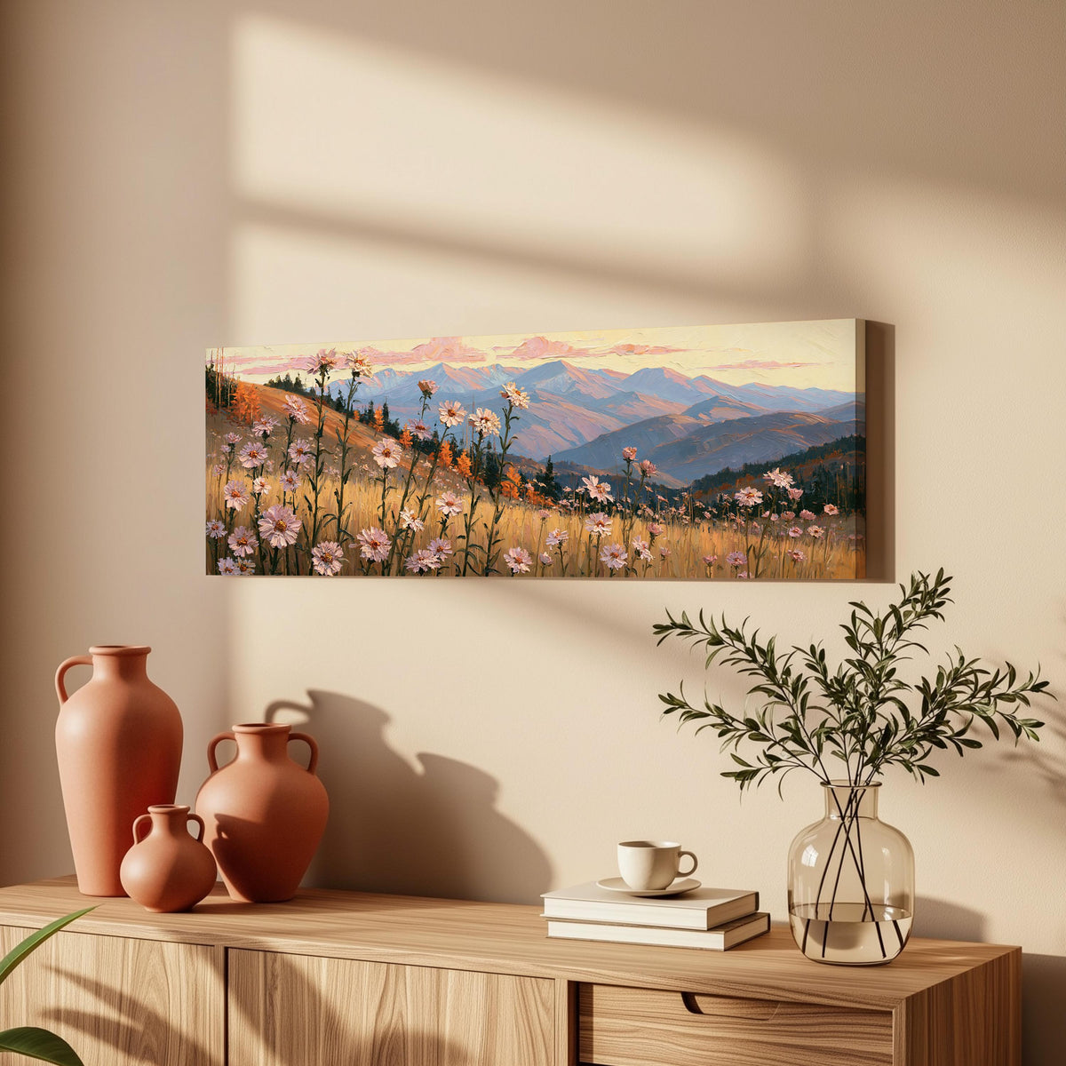 Wildflower meadow with mountains long horizontal canvas print above a wooden sideboard