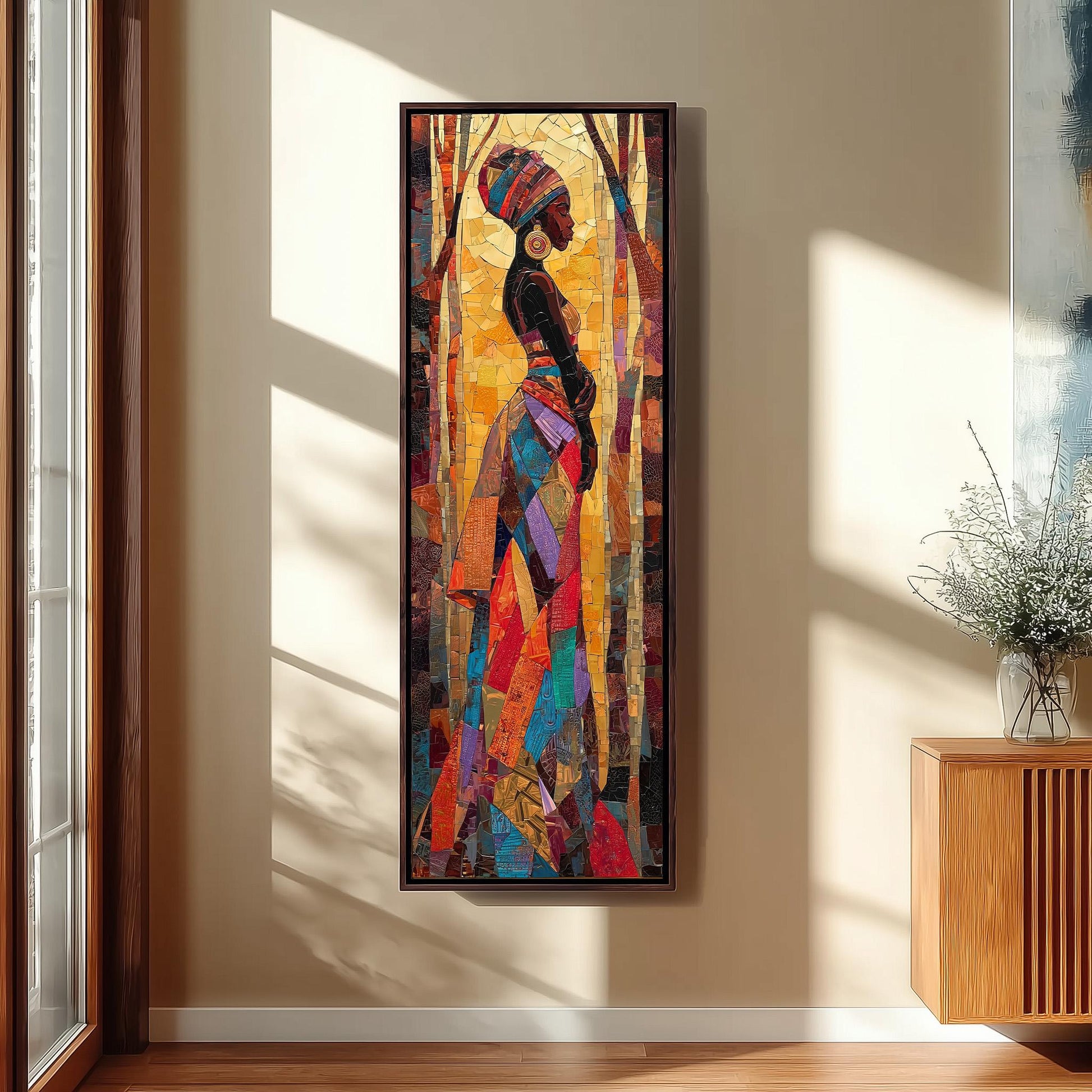 a large, colorful painting of a woman with a headdress hanging on a wall.