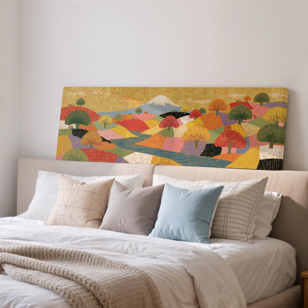 Mount Fuji over golden patchwork hills wide panoramic canvas print above a bed in a bedroom