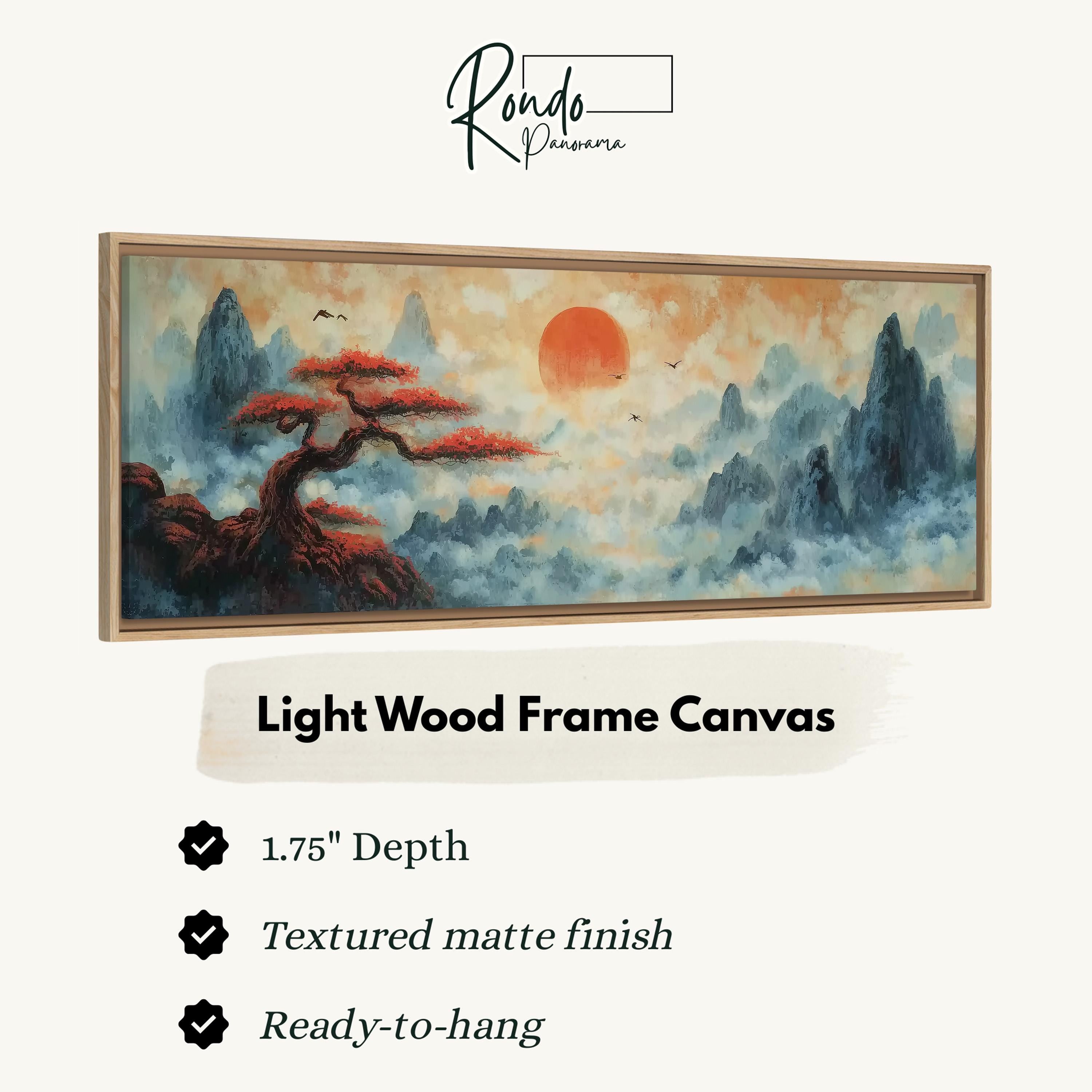 The image is a framed artwork depicting a landscape with a tree and mountains in the background, along with a large orange sun.