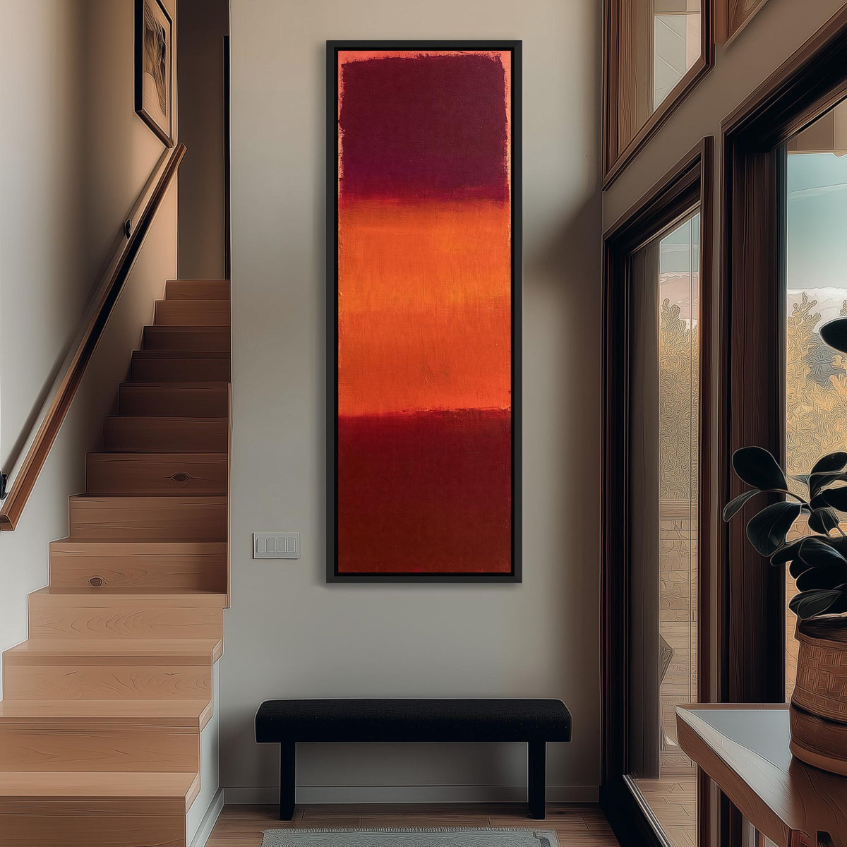 Color field bands in maroon, orange and red tall narrow canvas print beside a staircase in an entryway