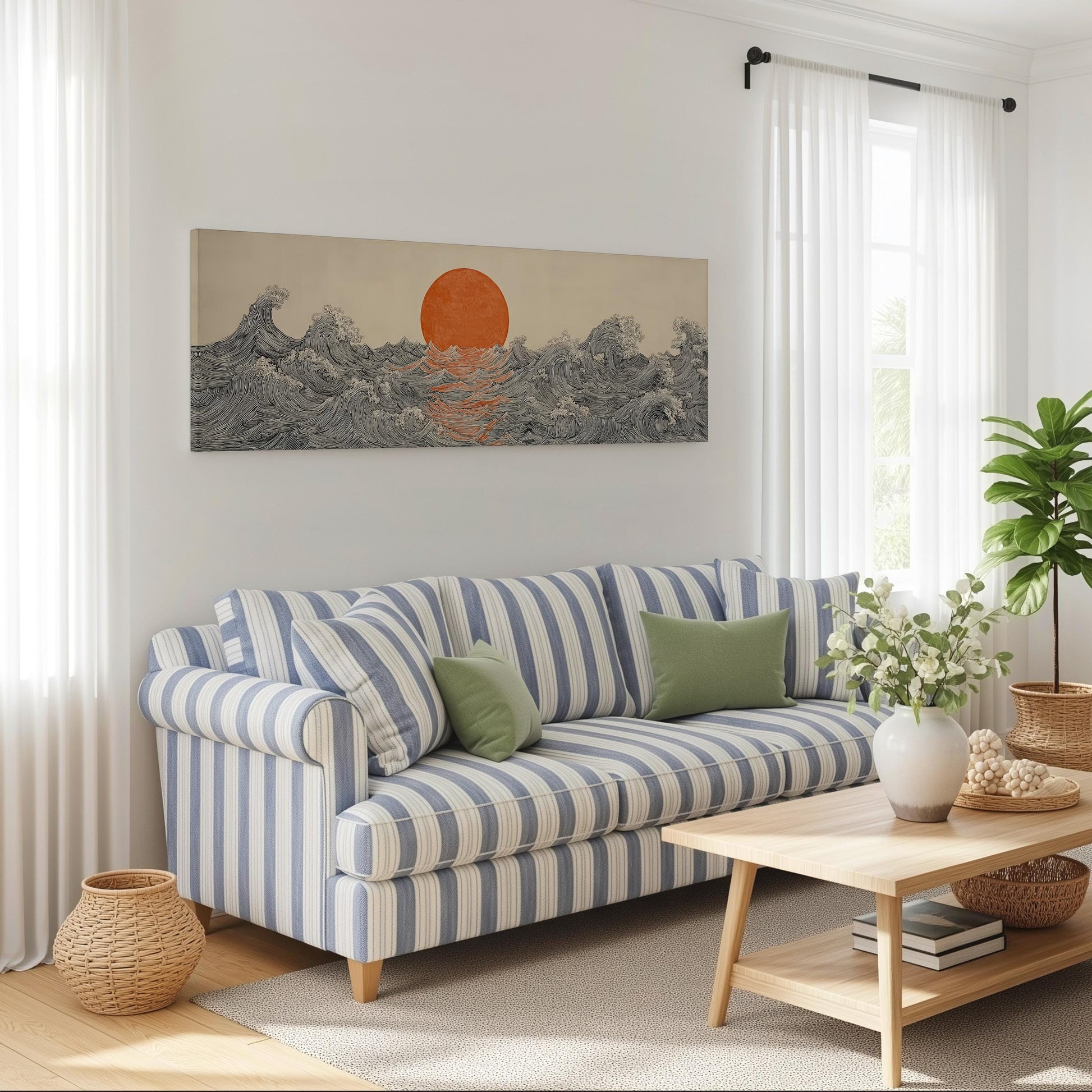 a cozy living room with a striped blue and white sofa, a wooden coffee table, and a large abstract painting of a sunset on the wall.