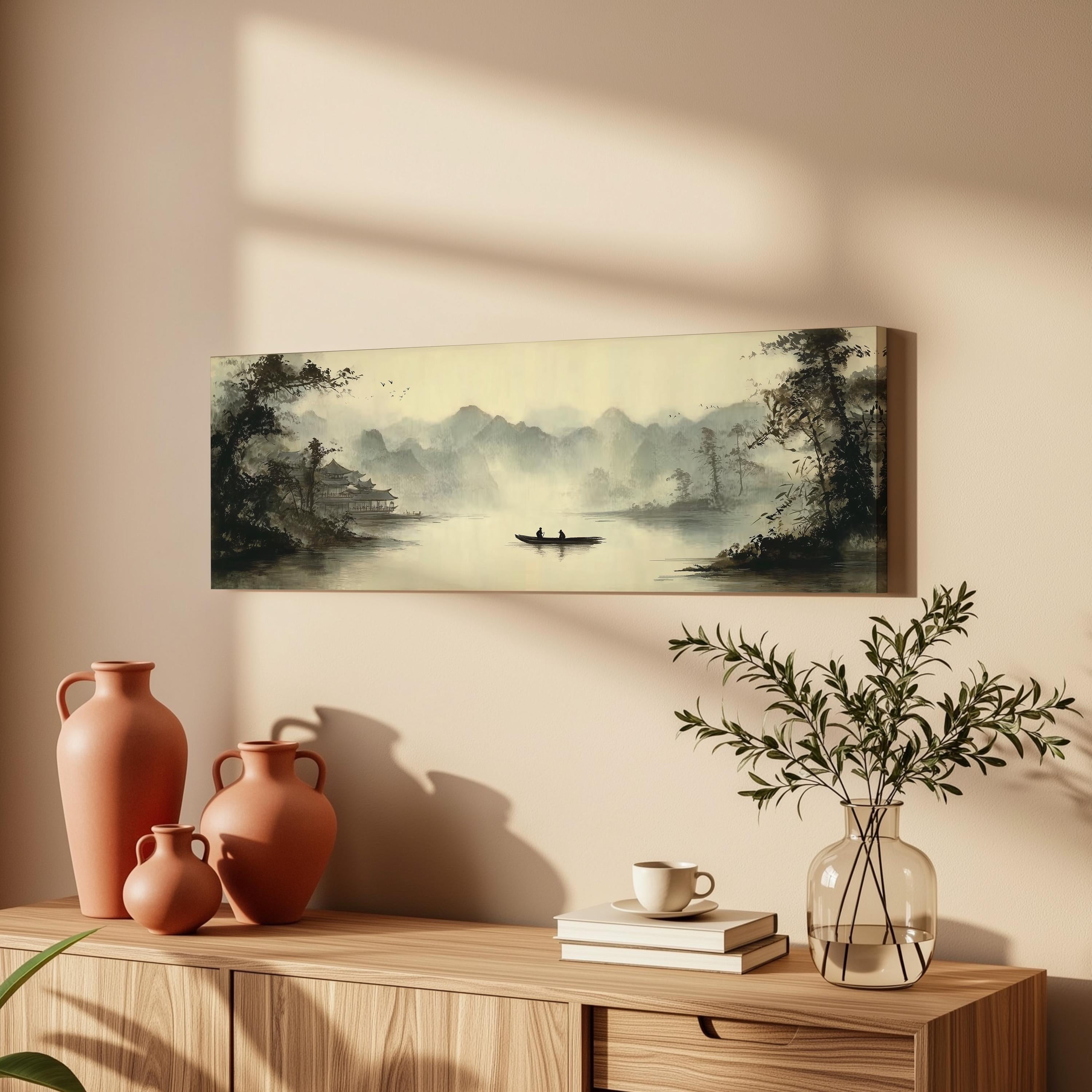 a serene indoor setting with a painting of a boat on a lake, a vase with greenery, and a wooden cabinet with books and a cup.
