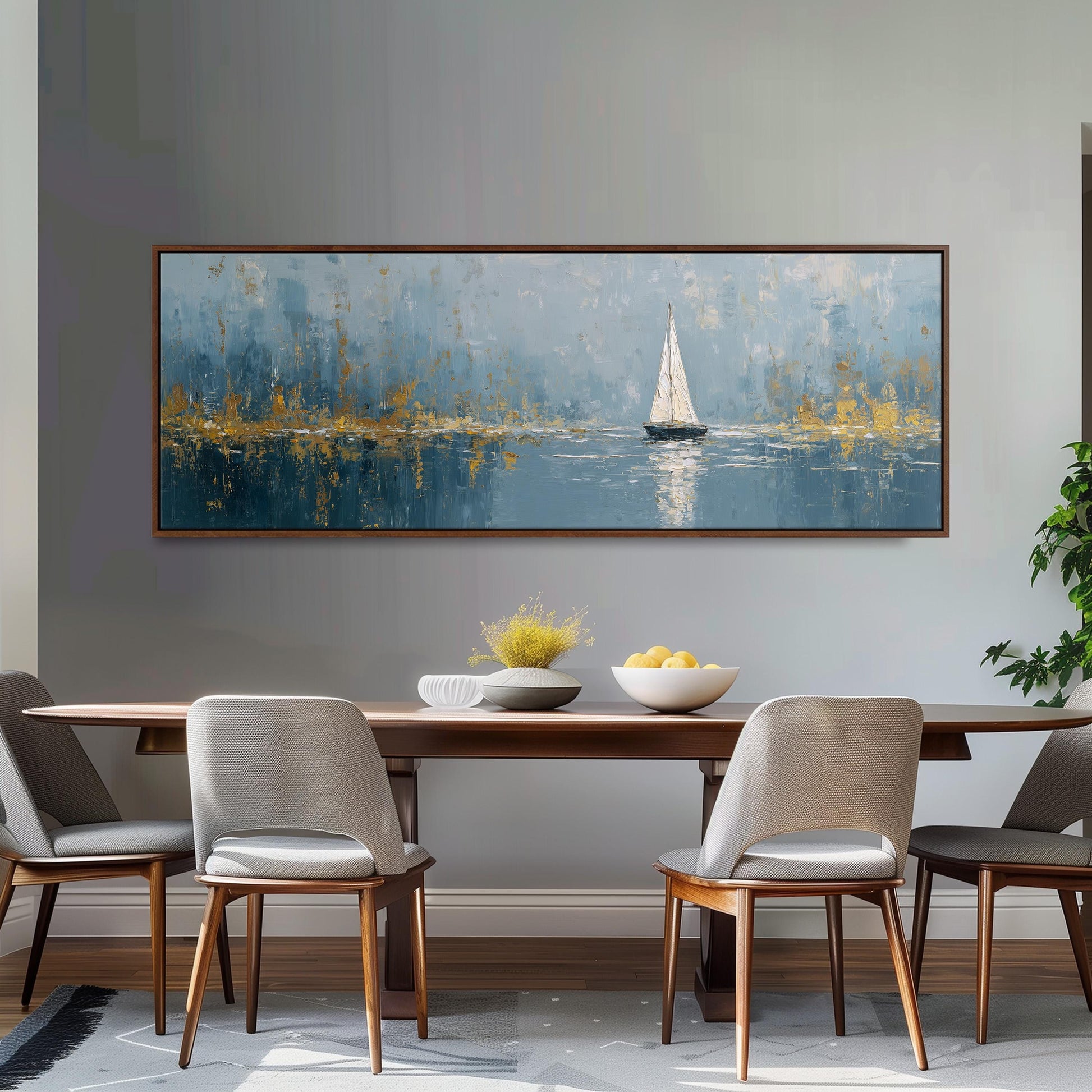 a large painting of a sailboat on a body of water, hanging on a wall above a wooden dining table with four chairs.