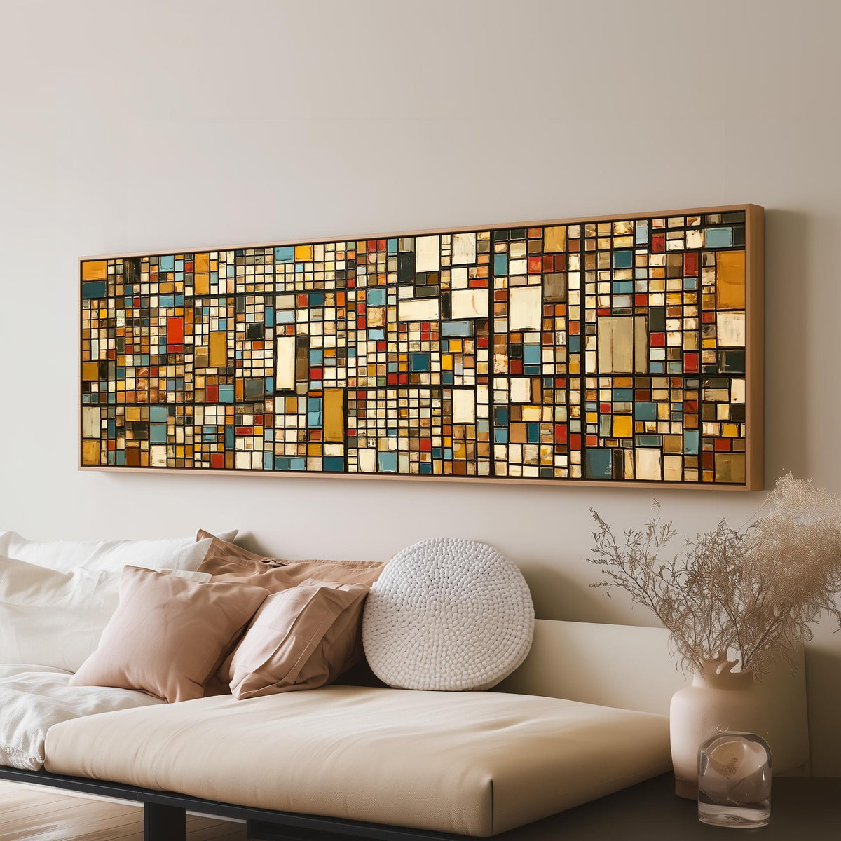 Ochre and blue mosaic tiles with red accents panoramic canvas print above a sofa in a living room