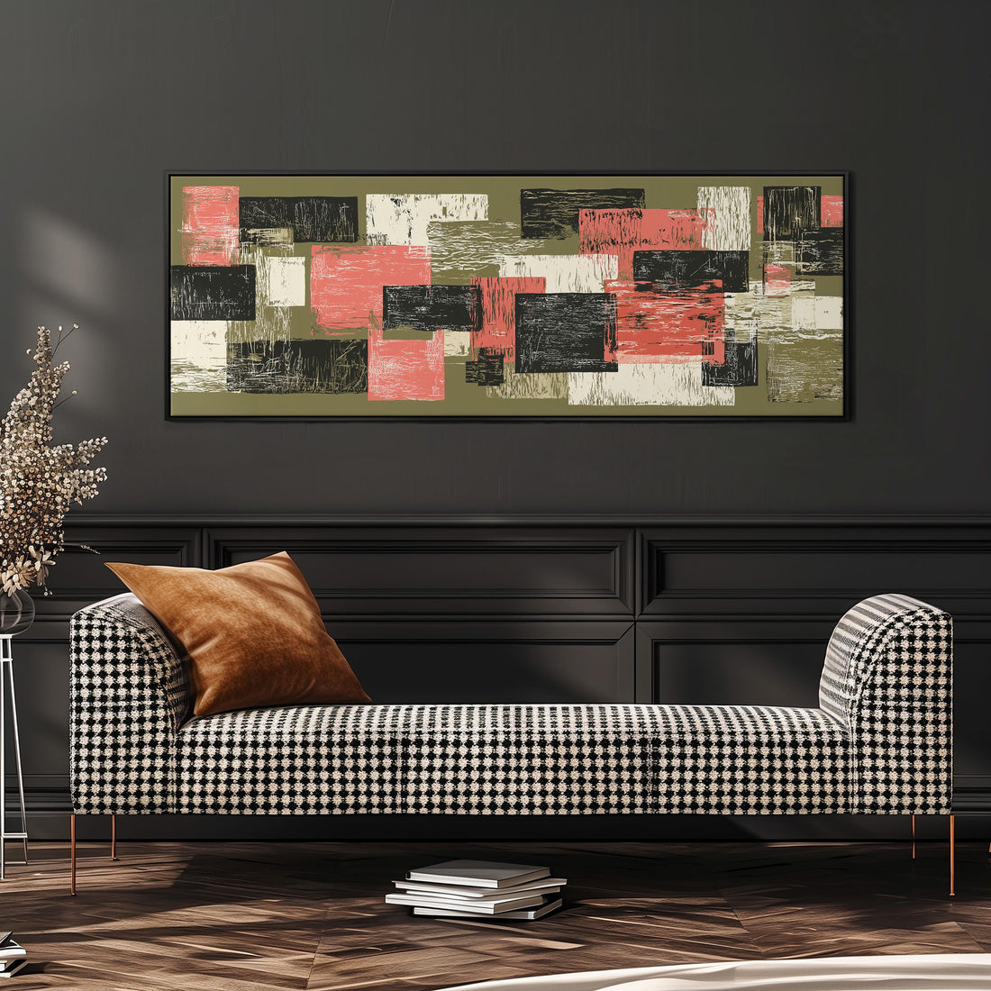 a dining room with a wooden table and four chairs. Above the table, there is a large abstract painting with a mix of pink, green, and black colors. The painting is hanging on a gray wall, and the dining table is set with a bowl of fruit and a vase of flowers.