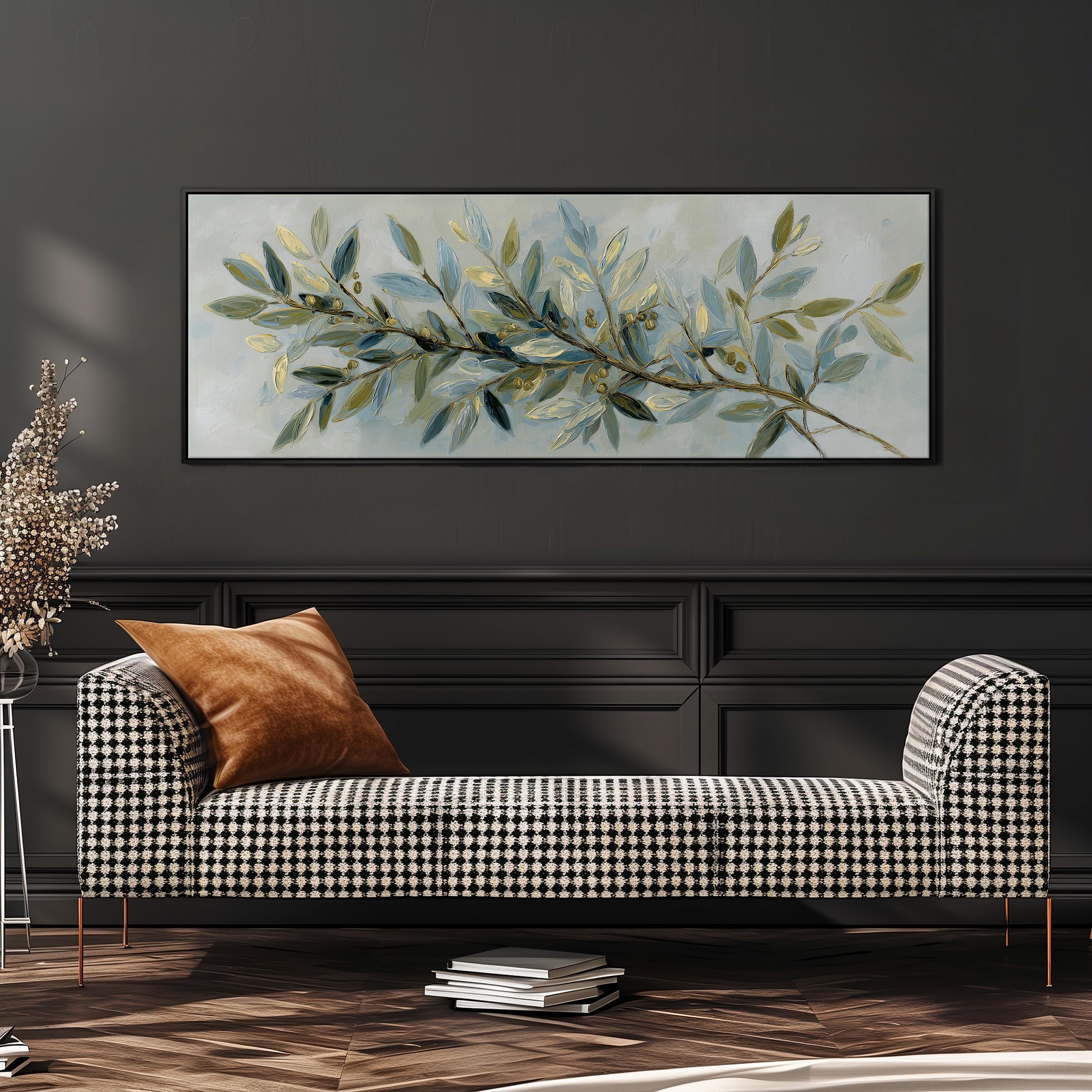 a black and white checkered sofa with a brown throw pillow, set against a dark wall with a large painting of a branch with green leaves hanging above it.