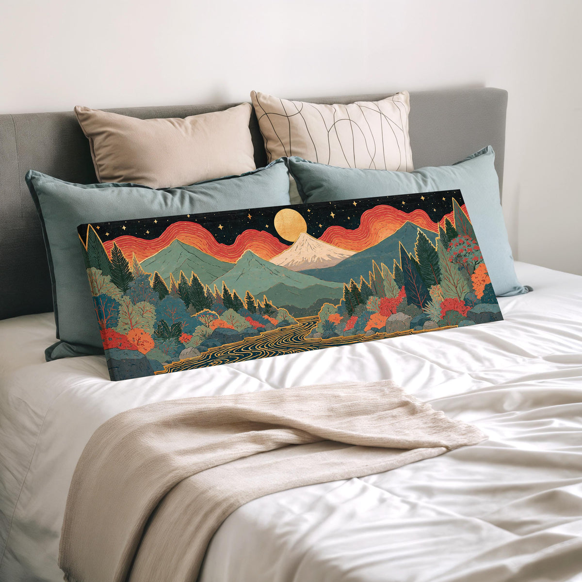 Mystic mountains under a moonrise wide panoramic canvas print laid on a bed to show its size