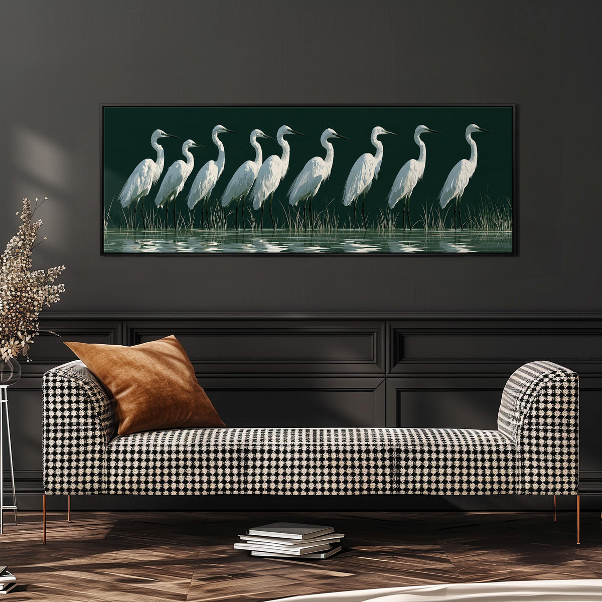 Row of white egrets on deep green wide panoramic canvas print above a bench in a dark living room