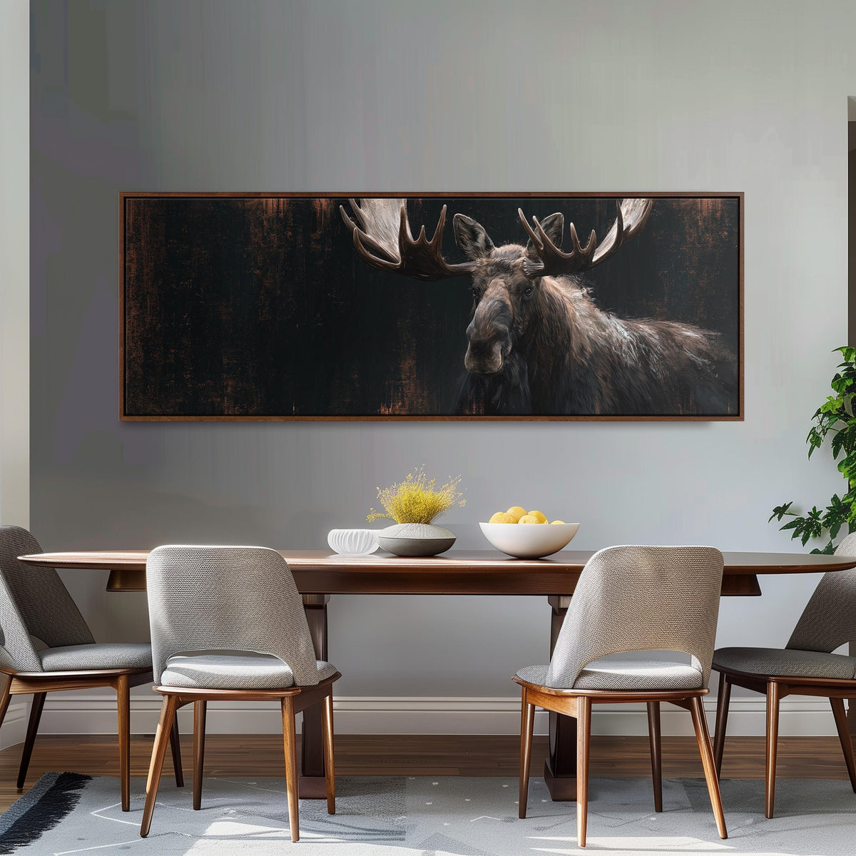 Dark moose portrait long horizontal canvas print above a dining table