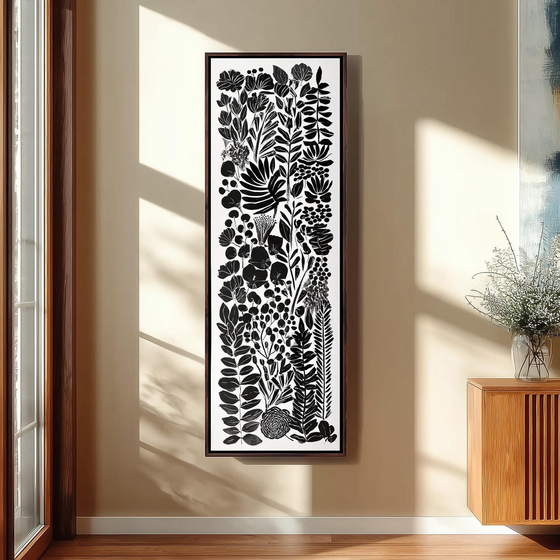 a modern and minimalist interior design with a large black and white abstract artwork hanging on the wall above a black bench.