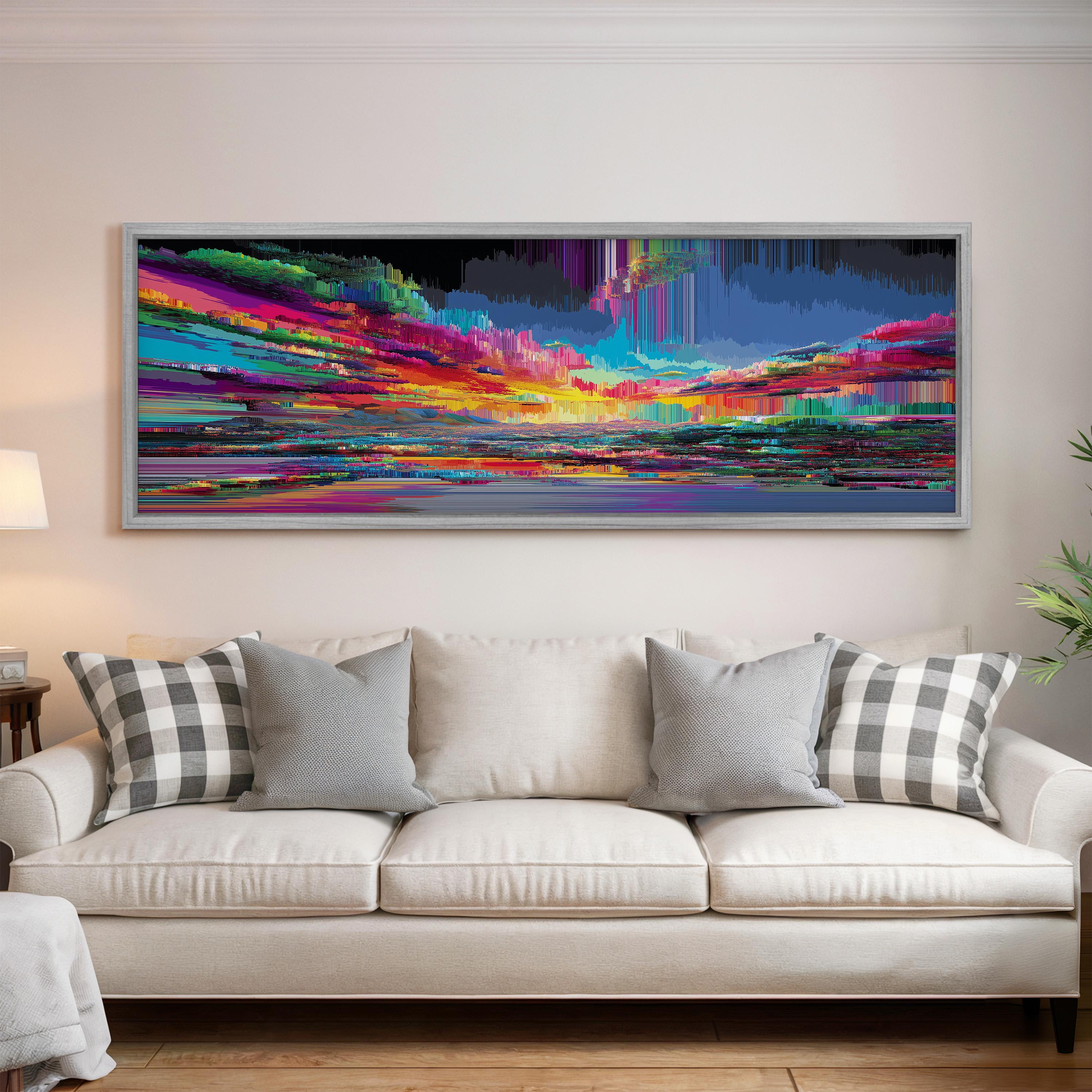 a large, colorful abstract painting hanging on a wall above a white couch with gray and white patterned pillows.