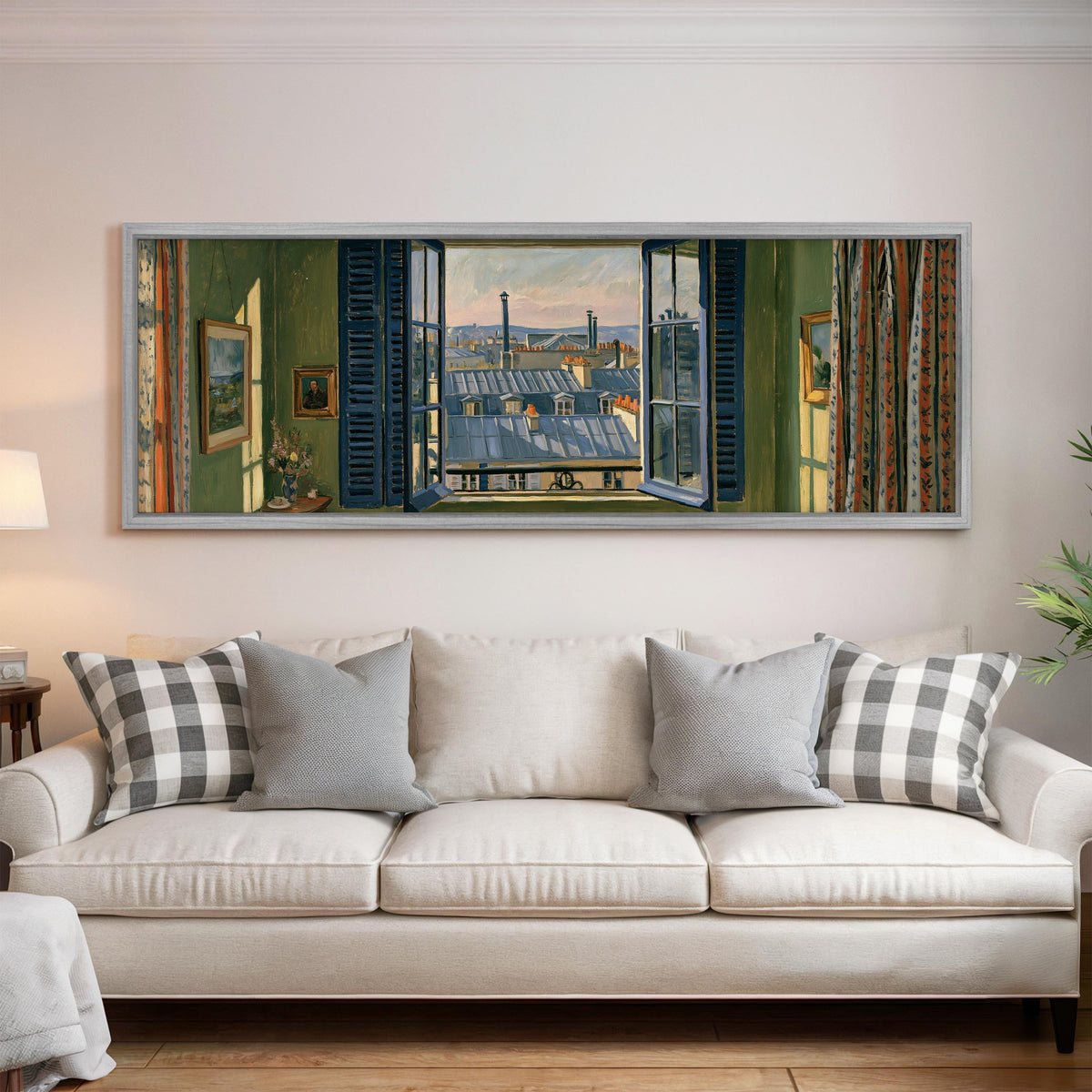 Paris zinc rooftops seen through a green room window panoramic canvas print above a white sofa in a bright living room