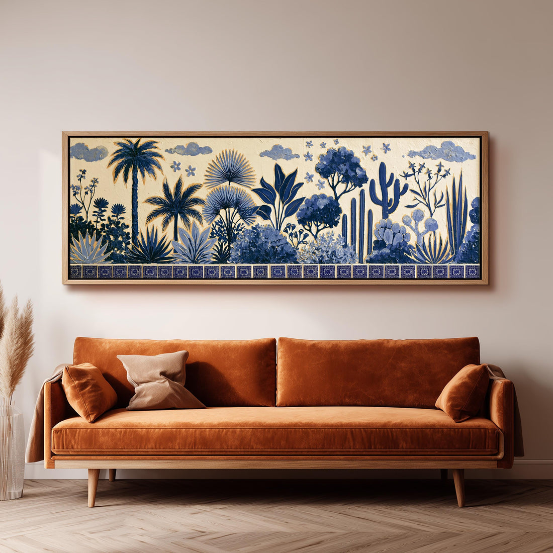 Blue palms, cacti and flowers pattern long horizontal canvas print above a sofa in a living room