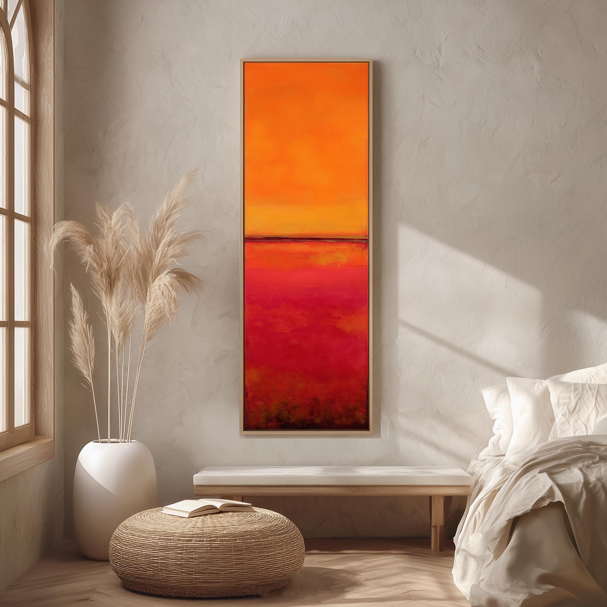 a modern bedroom with a large, vibrant painting of a sunset on the wall. The painting is framed in a wooden frame and hangs above a white bench. The room has a minimalist and clean design, with a large window providing natural light and a white ottoman in the center.