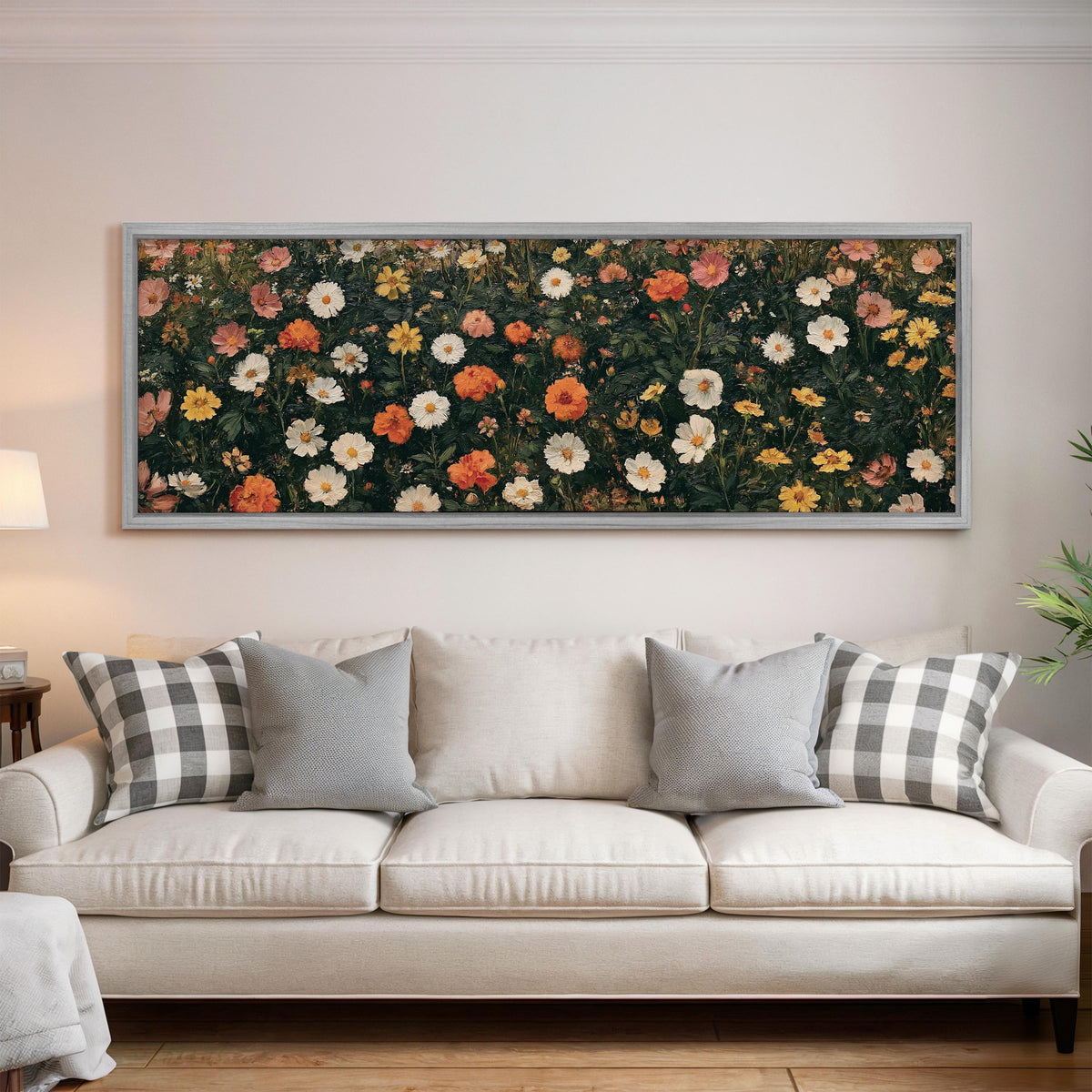 Blooming floral tapestry on dark green panoramic canvas print above a white sofa in a bright living room