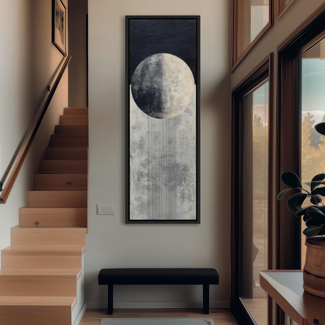 a hallway with a large painting of a moon hanging on the wall, a wooden staircase, a black bench, and a plant in a pot.