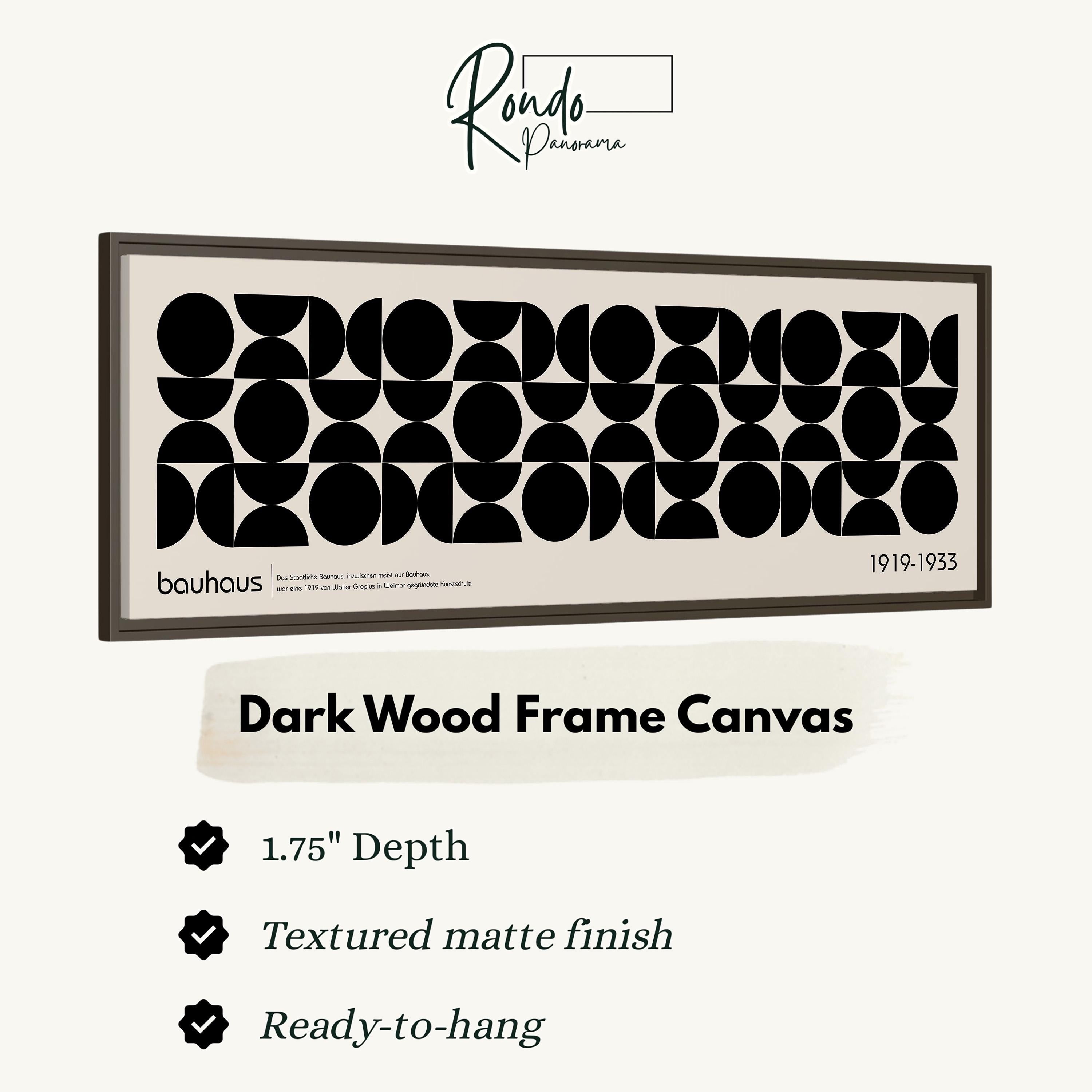 The image is a framed artwork featuring a geometric design with circles and lines in a dark wood frame.