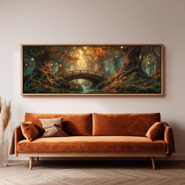a large, framed painting of a forest scene with a bridge in the background. The painting is hanging on a wall above a brown sofa, creating a cozy and inviting atmosphere in the room.