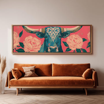 Longhorn with pink roses long horizontal canvas print above a sofa in a living room