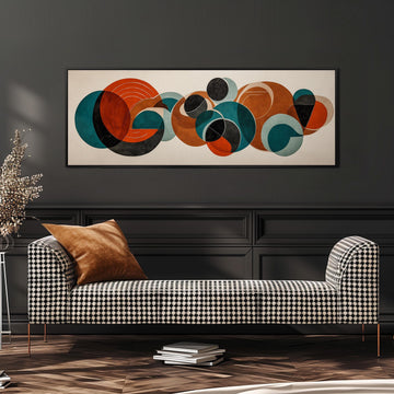 a modern living room with a black and white checkered sofa, a stack of books, and a large abstract painting hanging on the wall above the sofa.