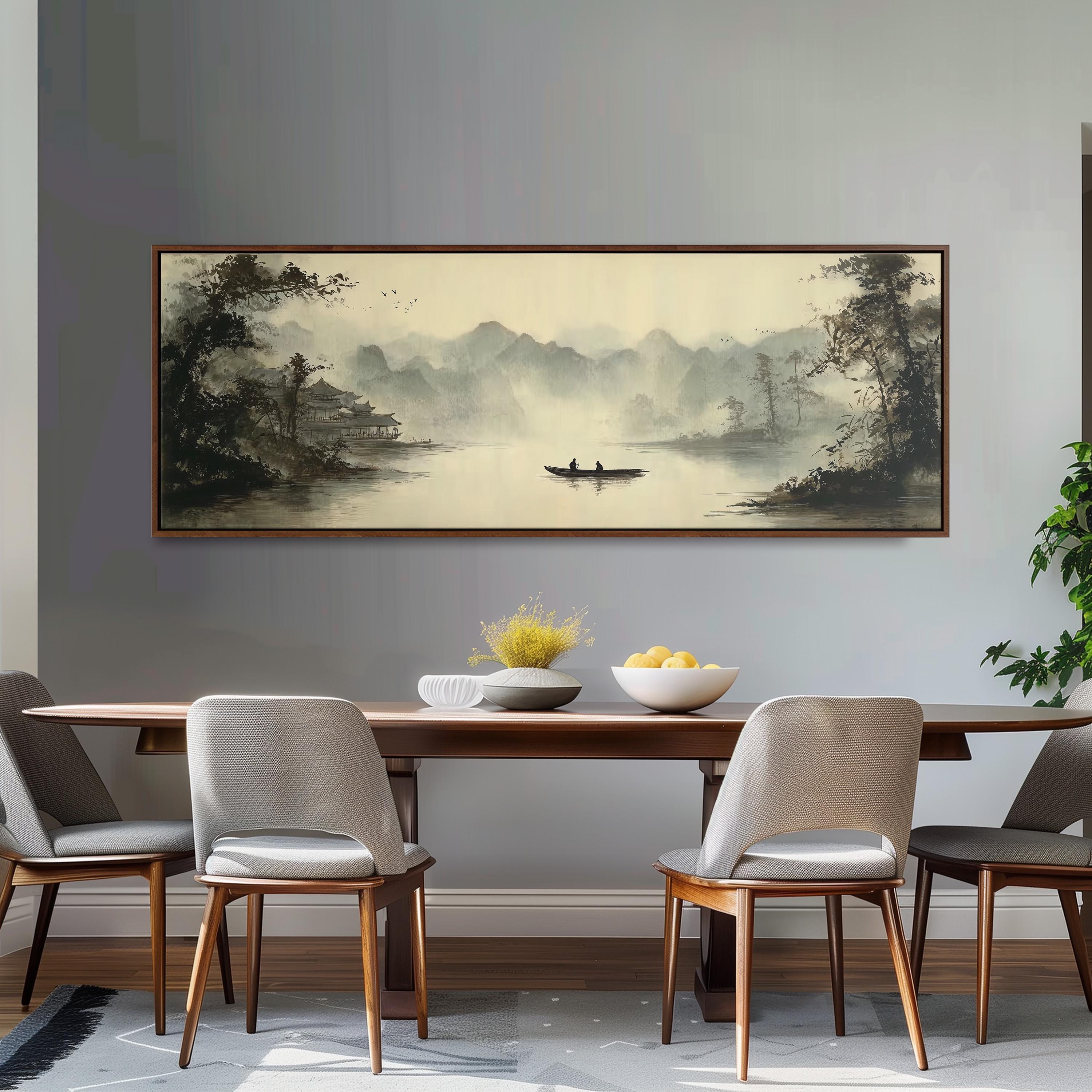 a dining room with a large painting of a serene landscape hanging on the wall above a wooden dining table with four chairs. The painting depicts a boat on a river surrounded by mountains, creating a peaceful and picturesque scene.