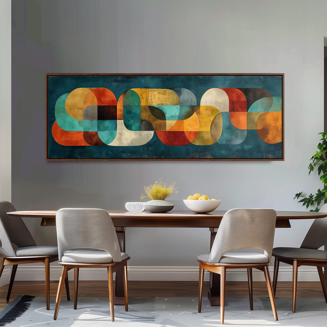 a modern living room with a black and white checkered sofa, a stack of books, and a large abstract painting hanging on the wall above the sofa.