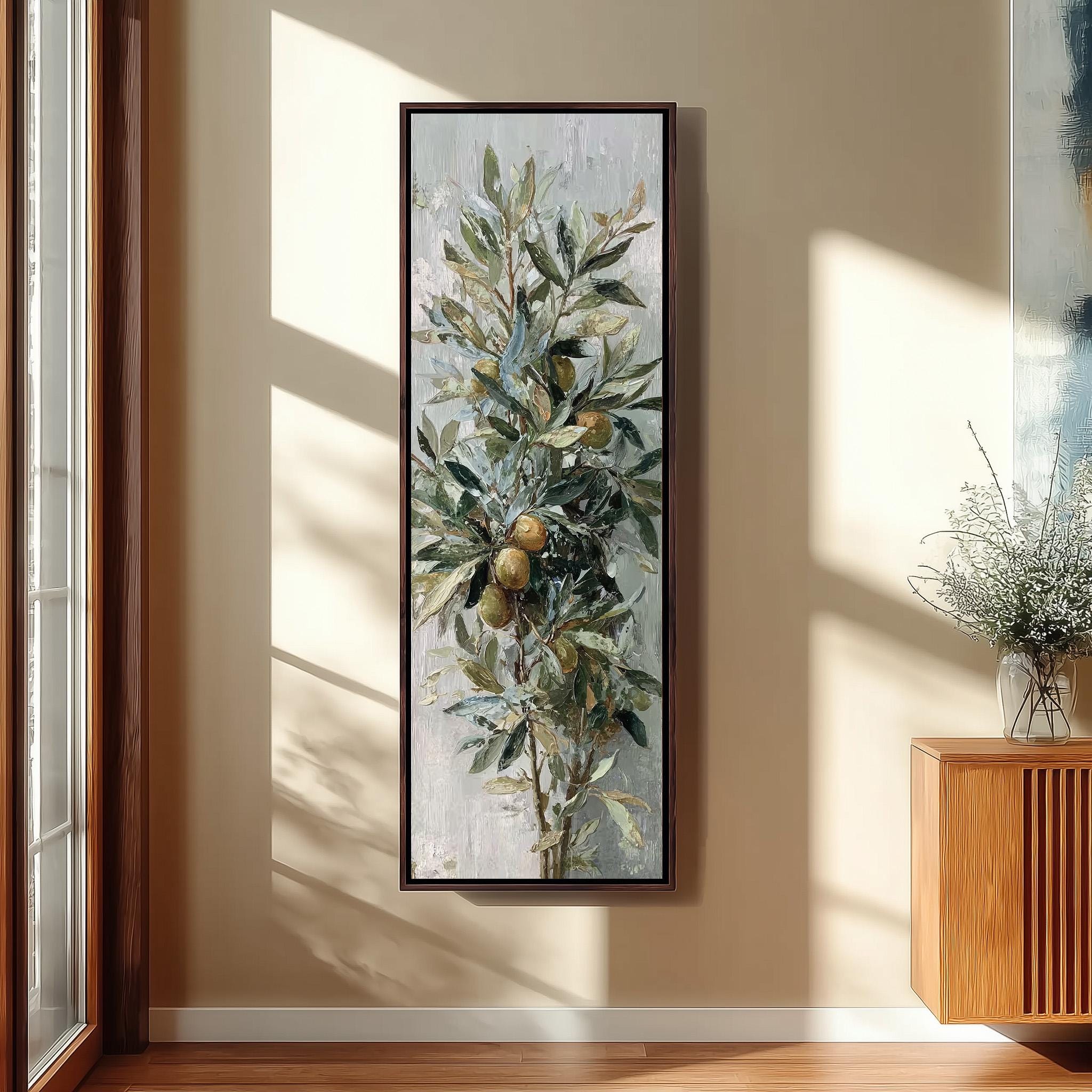 a large painting of a tree with green leaves and yellow fruit hanging on a wall in a room with wooden furniture.