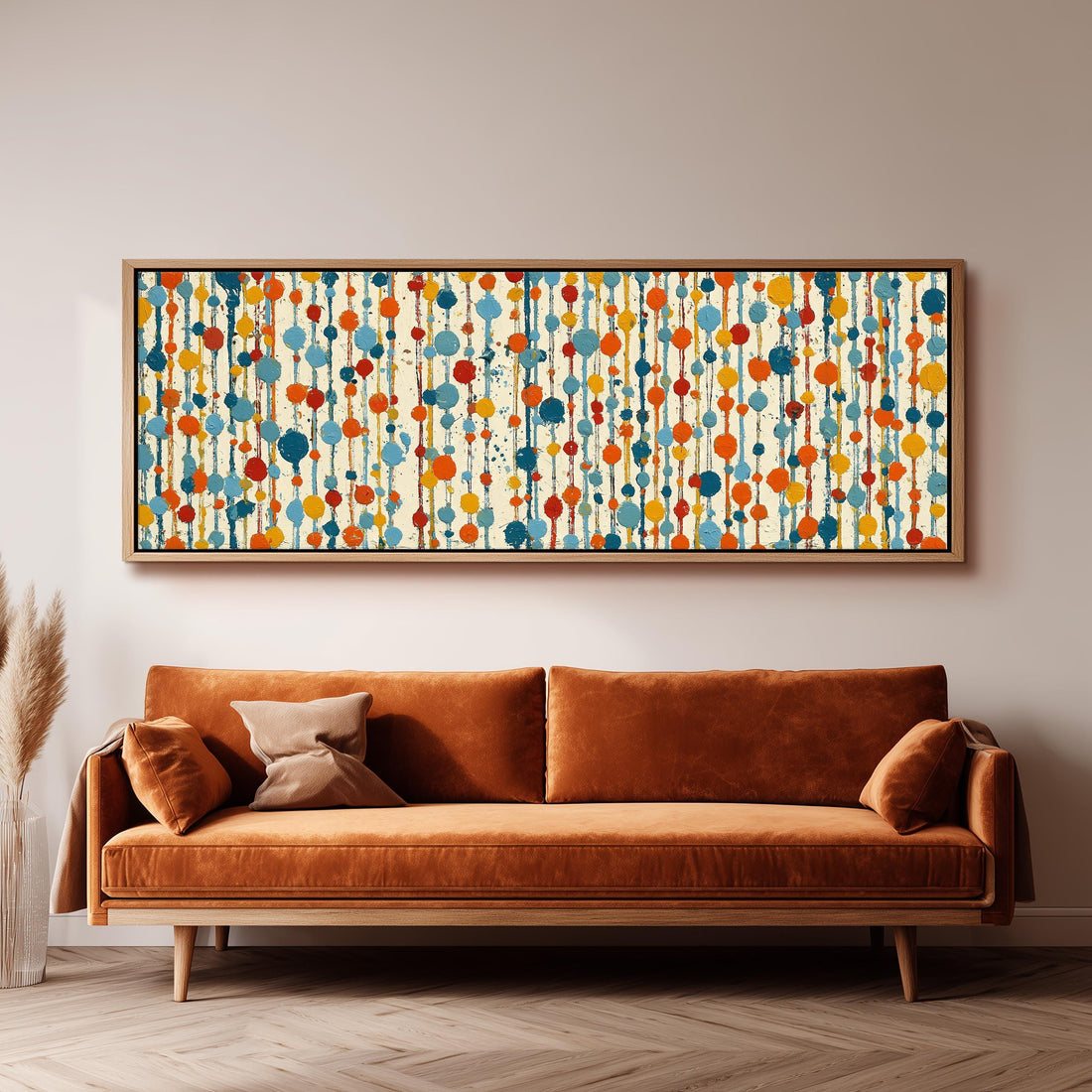 Strings of colorful polka dot blooms long horizontal canvas print above a sofa in a living room
