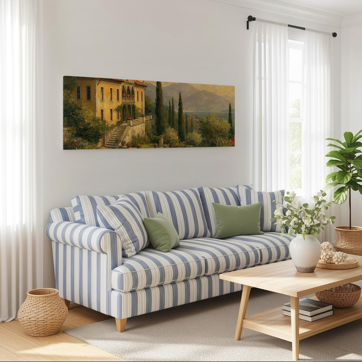 Tuscan villa among cypress hills long horizontal canvas print above a striped sofa in a coastal living room
