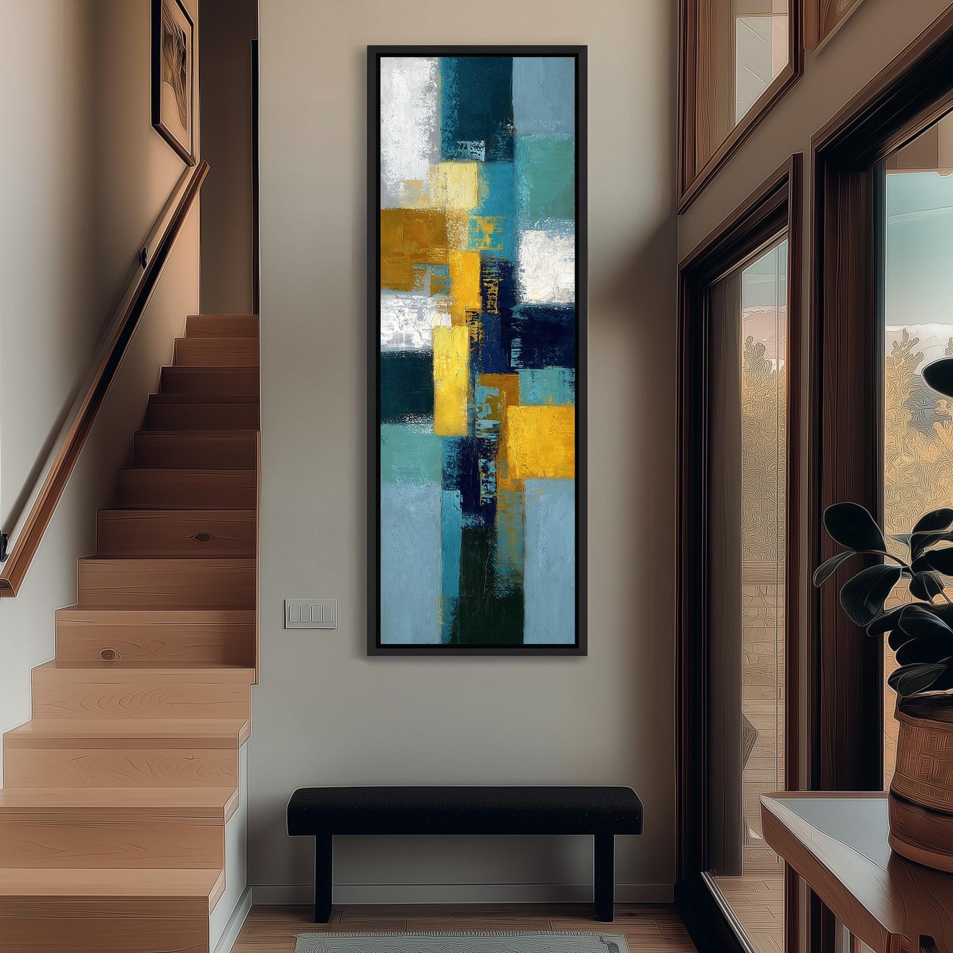 a modern interior design with a large abstract painting hanging on the wall above a black bench. The painting has a vibrant mix of blue, yellow, and green colors, creating a lively and energetic atmosphere in the space.