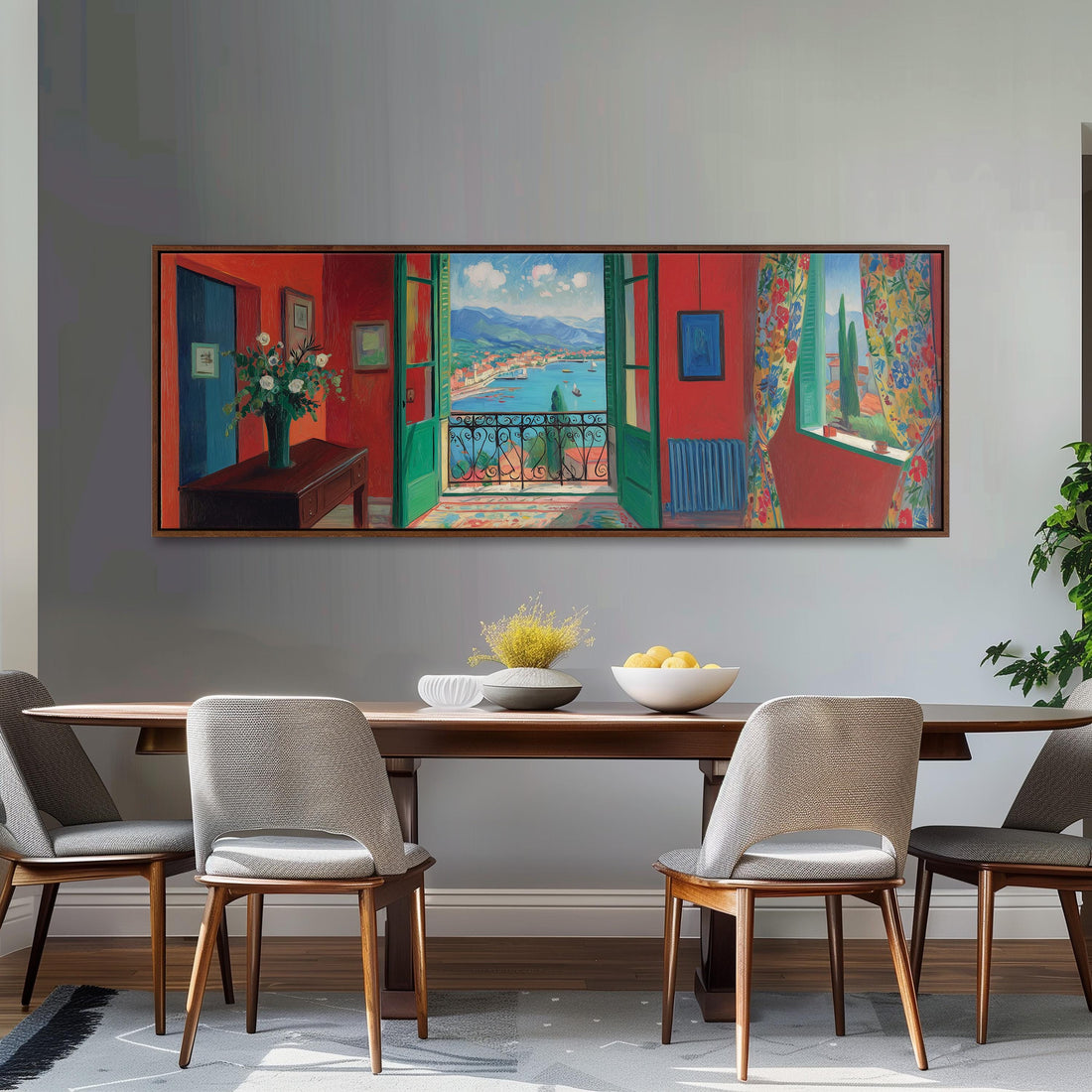 a dining room with a large, colorful painting hanging on the wall above a wooden table with four chairs. The painting depicts a scenic view of a balcony overlooking a town, with boats in the water.