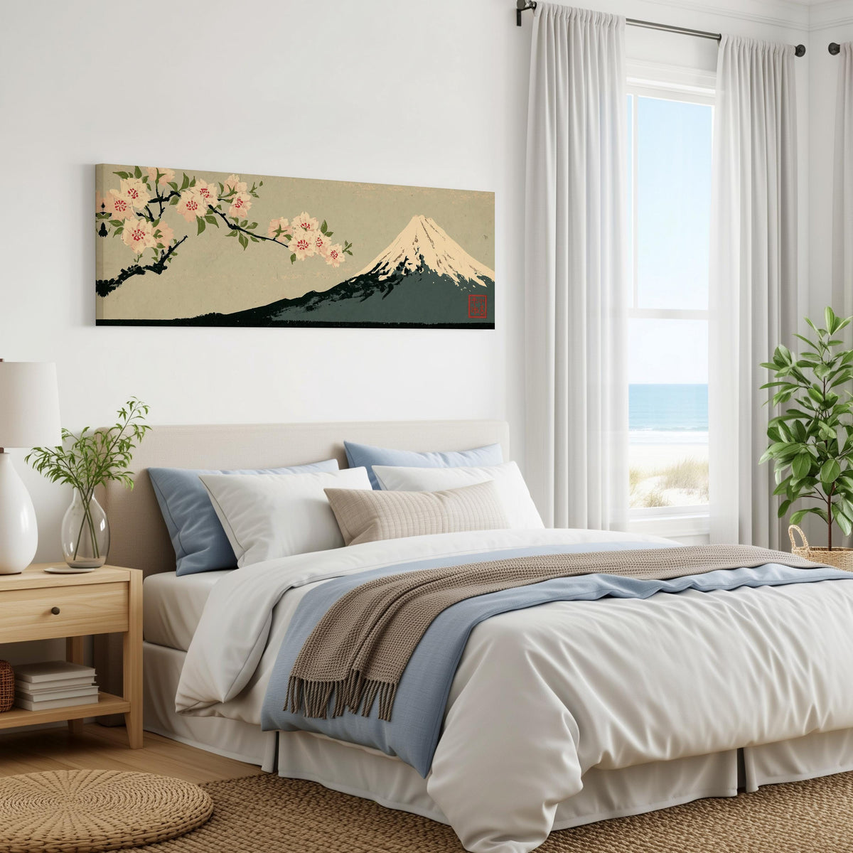 Cherry blossom branch and Mount Fuji panoramic canvas print above a bed in a coastal bedroom