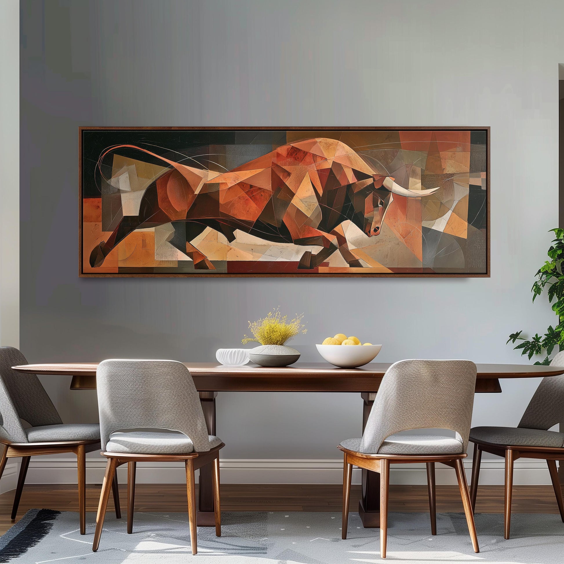 a large abstract painting of a bull on the wall above a wooden dining table with four chairs.