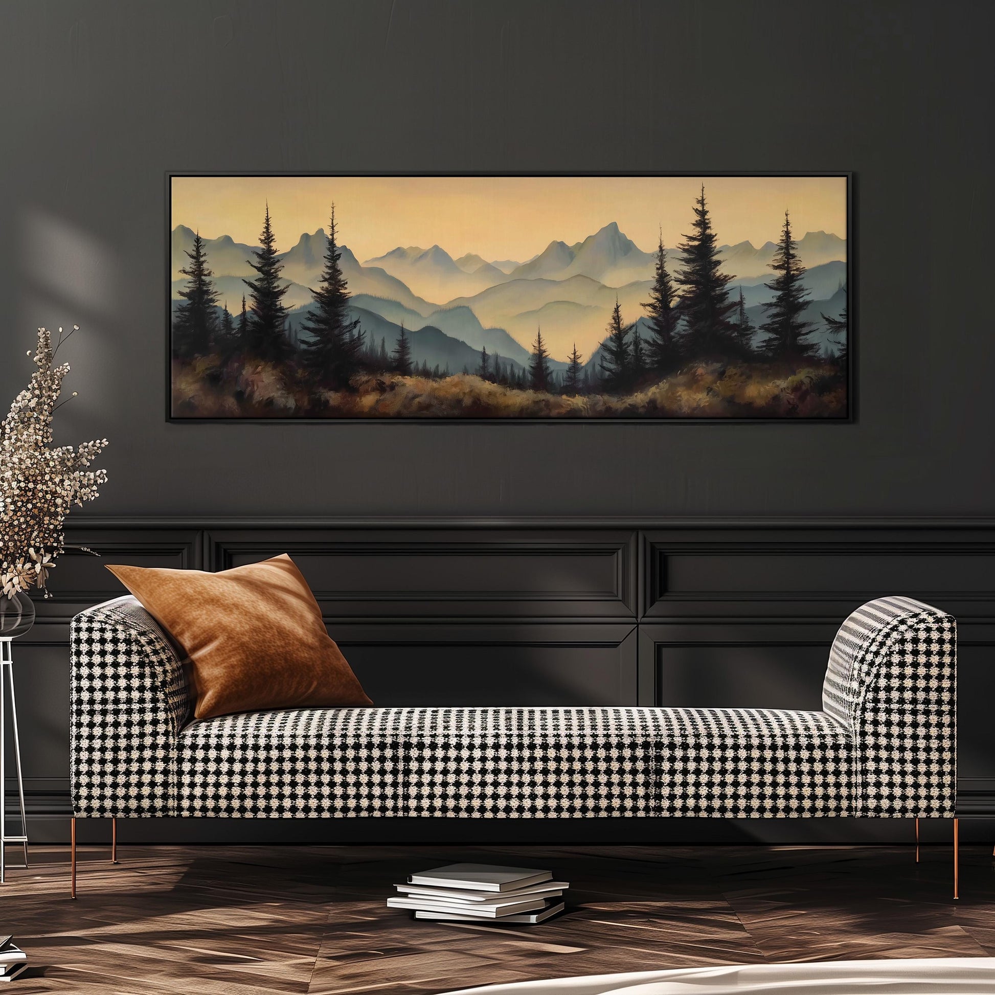a large landscape painting hanging on a wall above a black and white checkered sofa with a brown throw pillow.