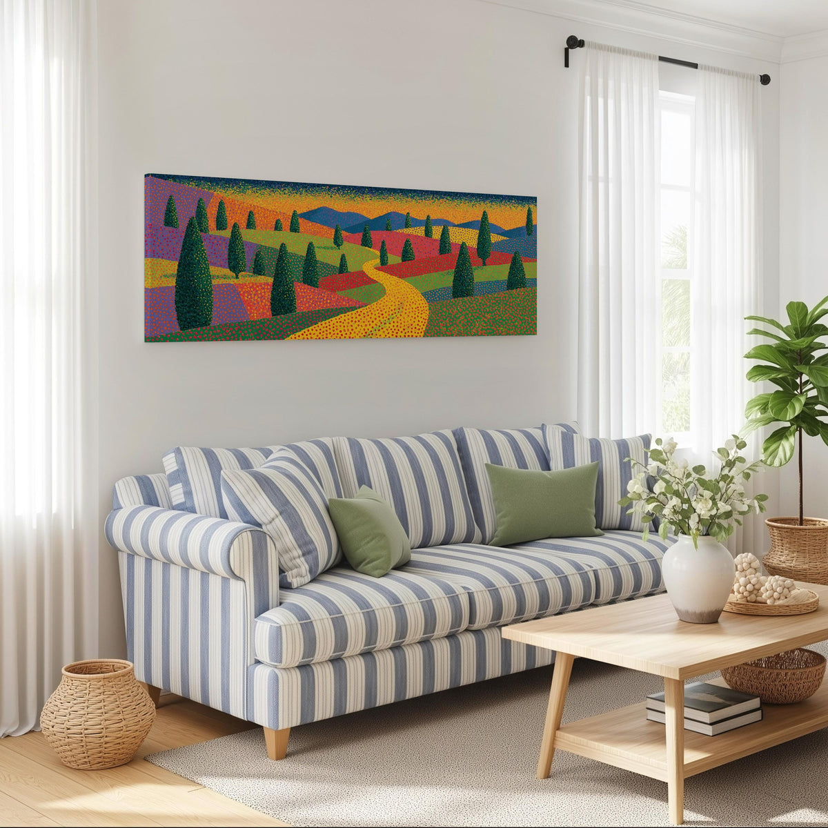 Cypress valley with a winding road long horizontal canvas print above a striped sofa in a coastal living room