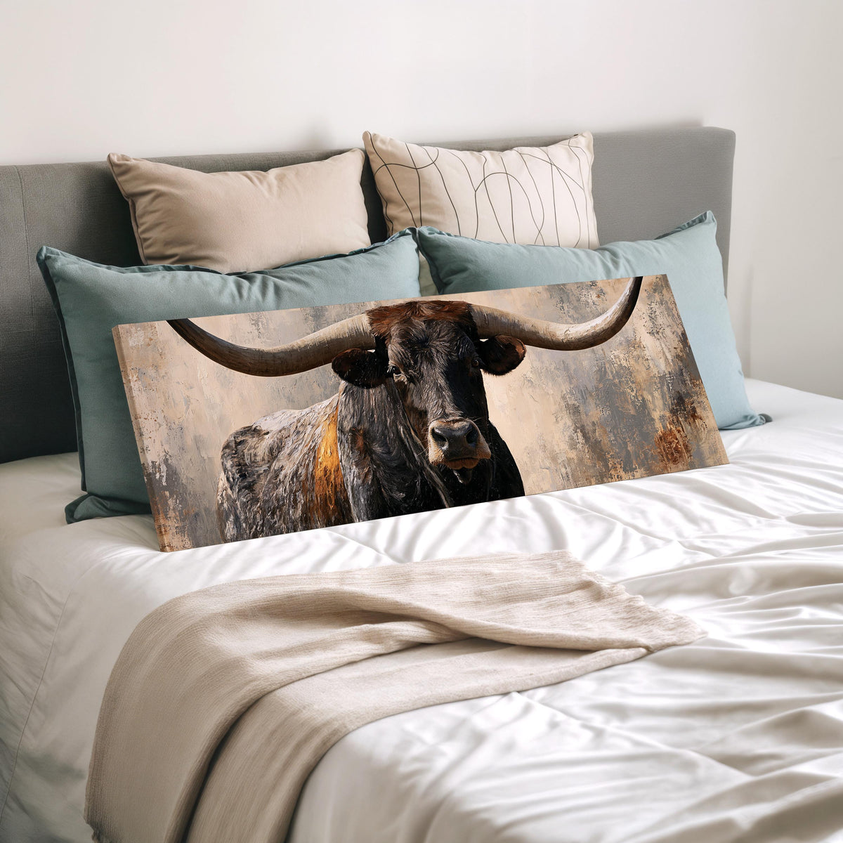 Longhorn bull portrait wide panoramic canvas print laid on a bed to show its size