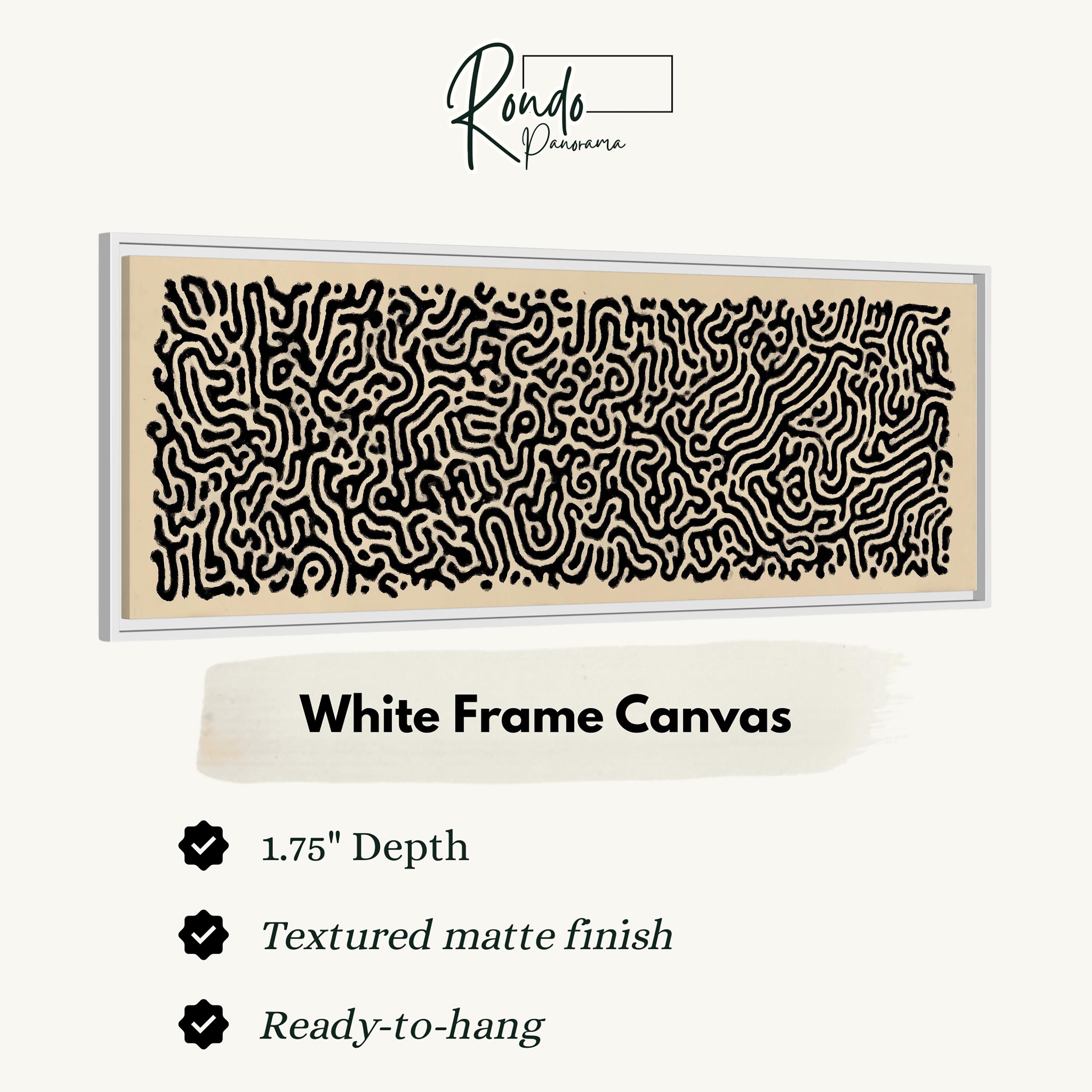 a white frame canvas with a black abstract pattern on it.
