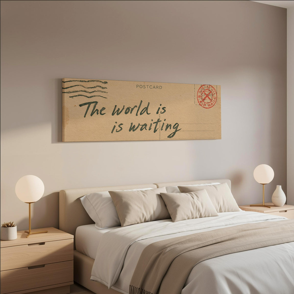 Vintage postcard saying the world is waiting wide panoramic canvas print above a bed in a neutral bedroom