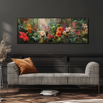 a large, colorful painting of flowers hanging on a wall above a black and white checkered sofa in a living room setting.