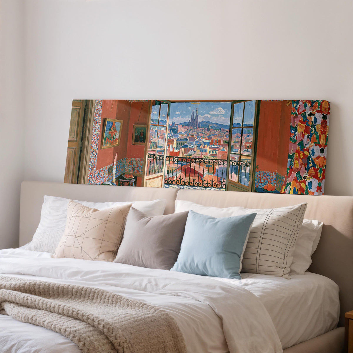 Barcelona seen through an open window wide panoramic canvas print above a bed in a bedroom