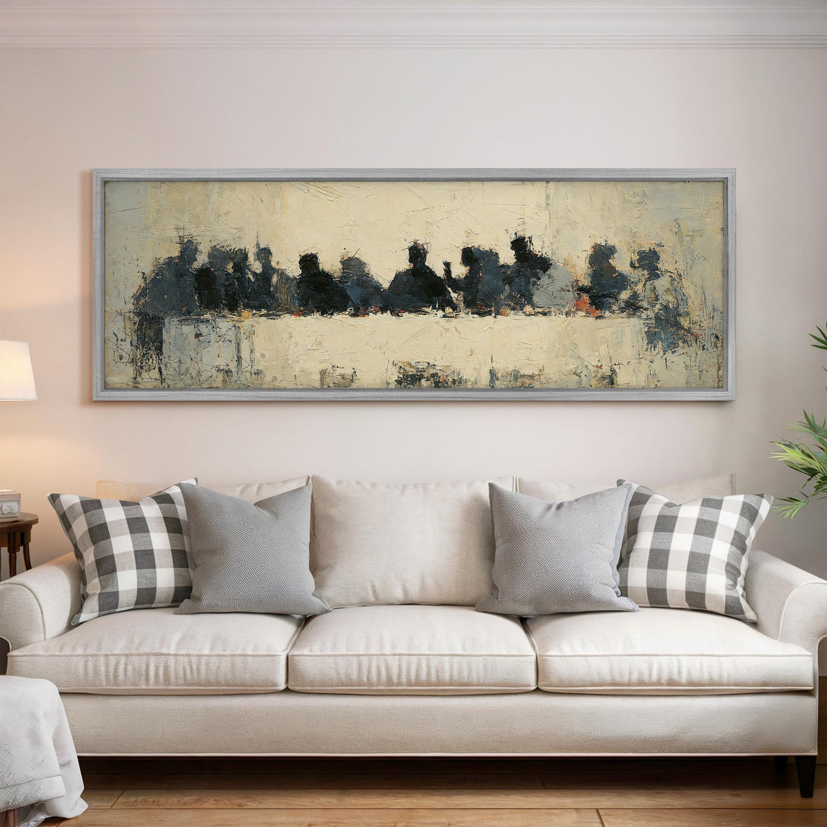 Abstract silhouette Last Supper panoramic canvas print above a white sofa in a bright living room