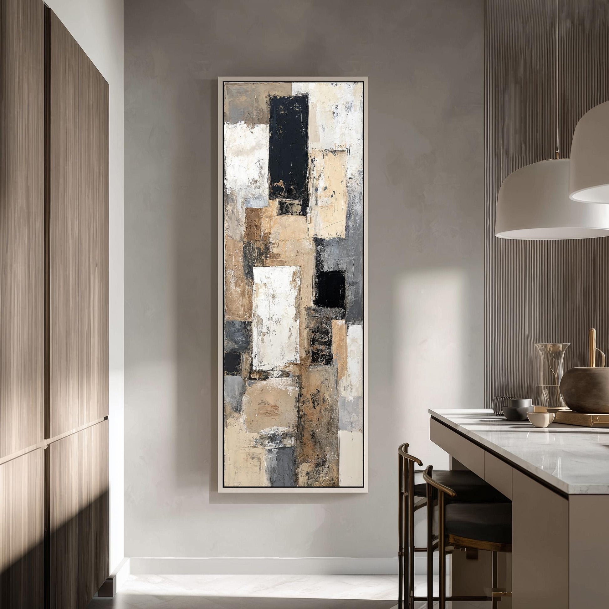 a modern kitchen with a large abstract painting hanging on the wall above a counter.