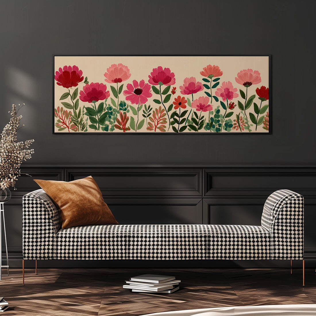 a large, framed print of a floral design hanging on a wall above a brown sofa.