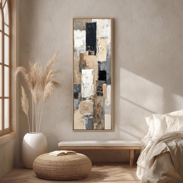a serene and modern bedroom with a large abstract painting hanging on the wall, a white bed with a white pillow, a white vase with tall potted plants, and a woven ottoman.