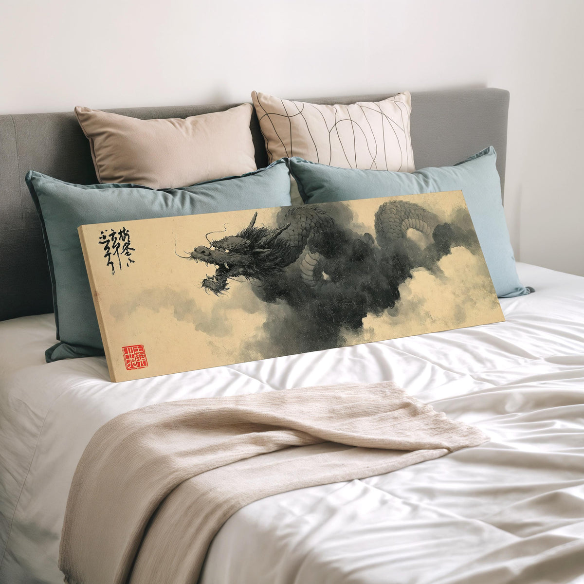 Ink dragon in the clouds wide panoramic canvas print laid on a bed to show its size